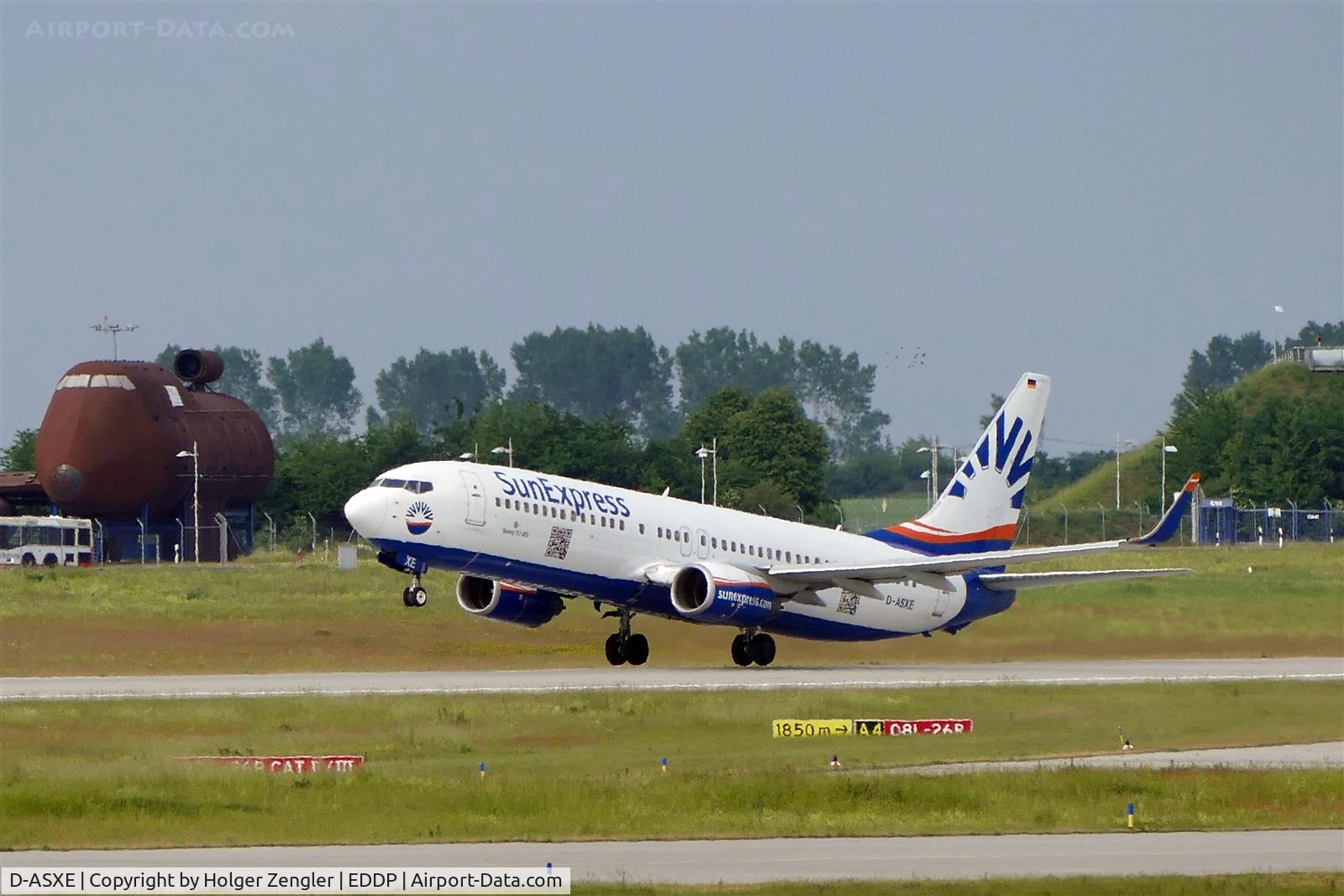 D-ASXE, 2002 Boeing 737-8CX C/N 32365, View to rwy 26R and fire training center....