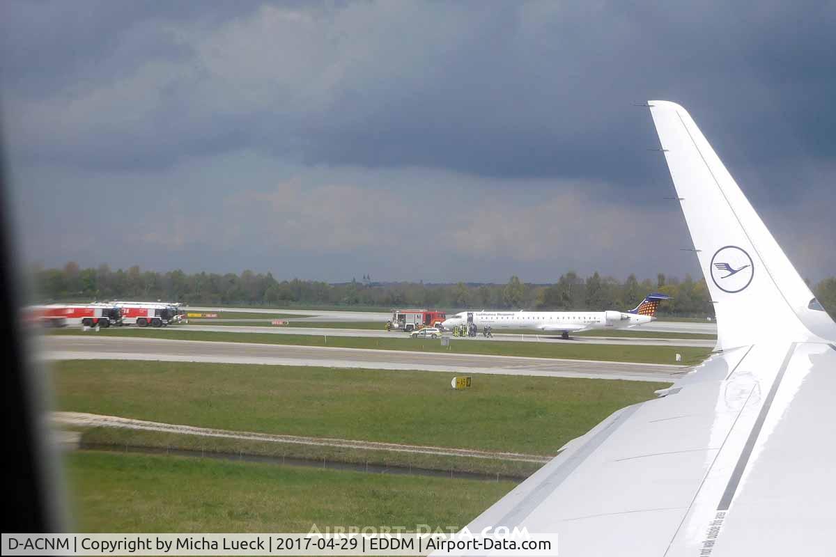 D-ACNM, 2010 Bombardier CRJ-900LR (CL-600-2D24) C/N 15253, Not sure what the incident was, but there were 4+ fire engines plus airport vehicles surrounding the aircraft, which stopped next to the active runway.