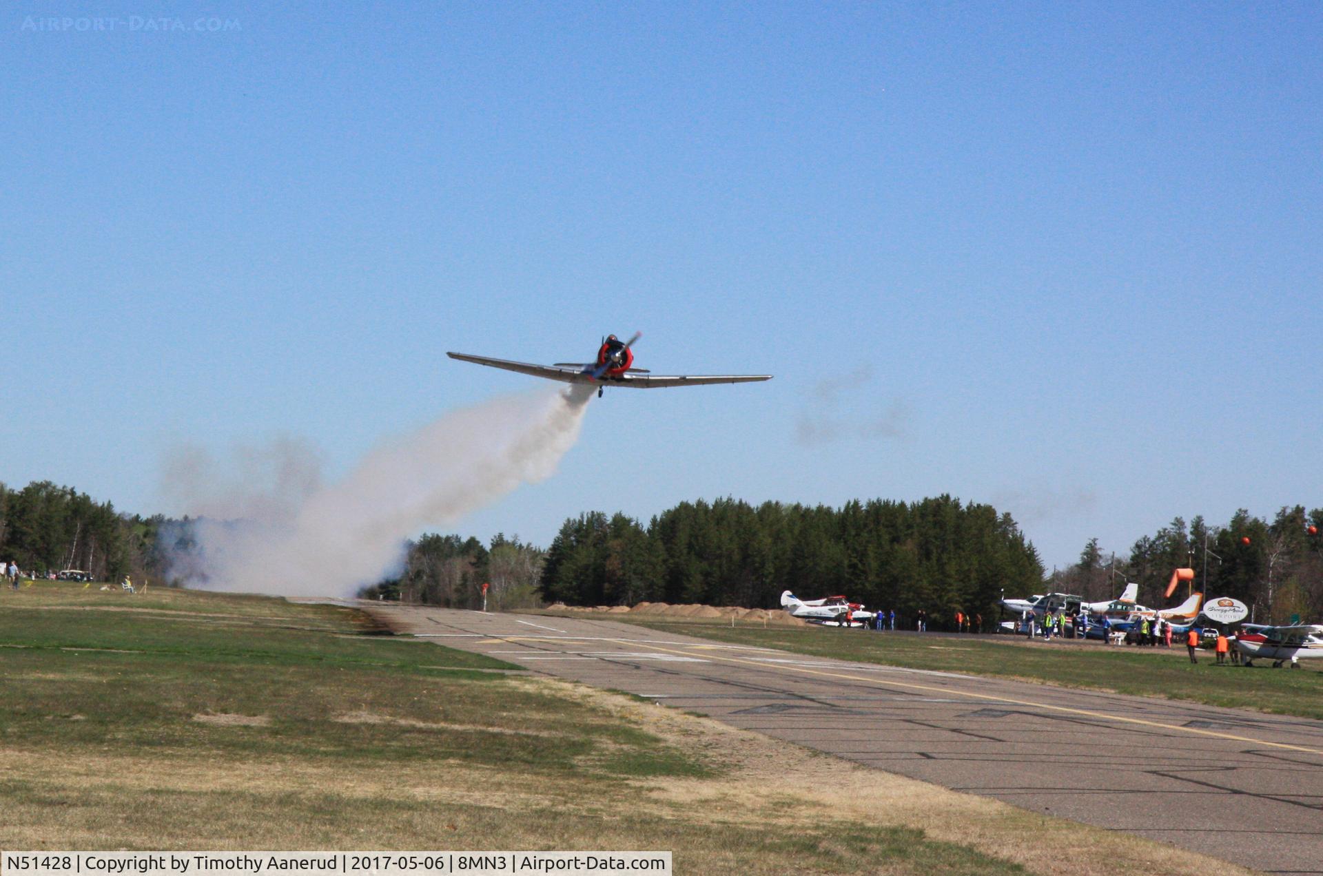 N51428, 1957 North American AT-6C C/N 51429, Smoke On! 1957 North American SNJ-4 C/N 88-13891