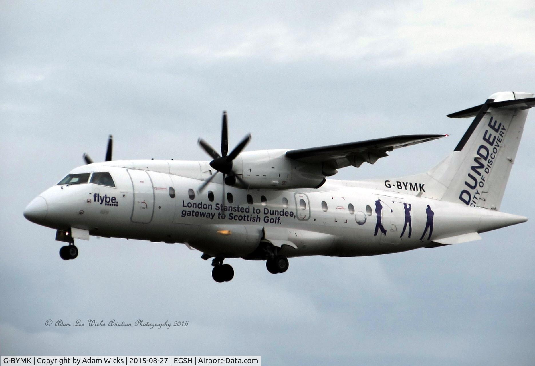 G-BYMK, 1996 Dornier 328-100 C/N 3062, On approach Runway 27 R during a overcast day