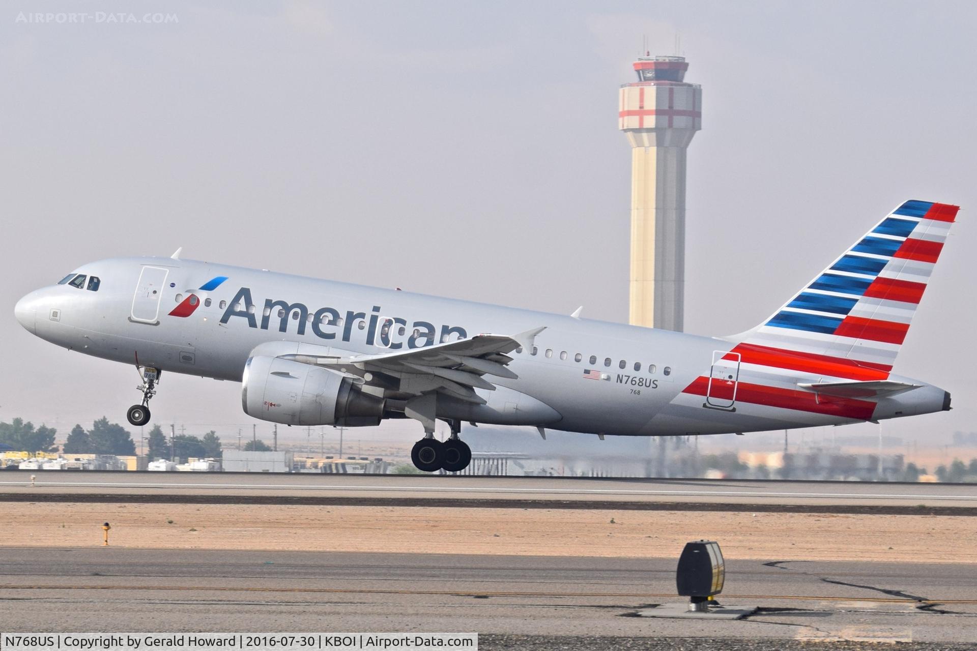 N768US, 2000 Airbus A319-112 C/N 1389, Departing RWY 10L on a smoky morning.