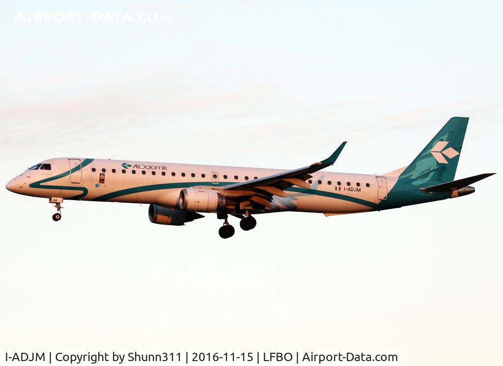 I-ADJM, 2009 Embraer 195LR (ERJ-190-200LR) C/N 19000258, Landing rwy 32L with additional sticker ner door...