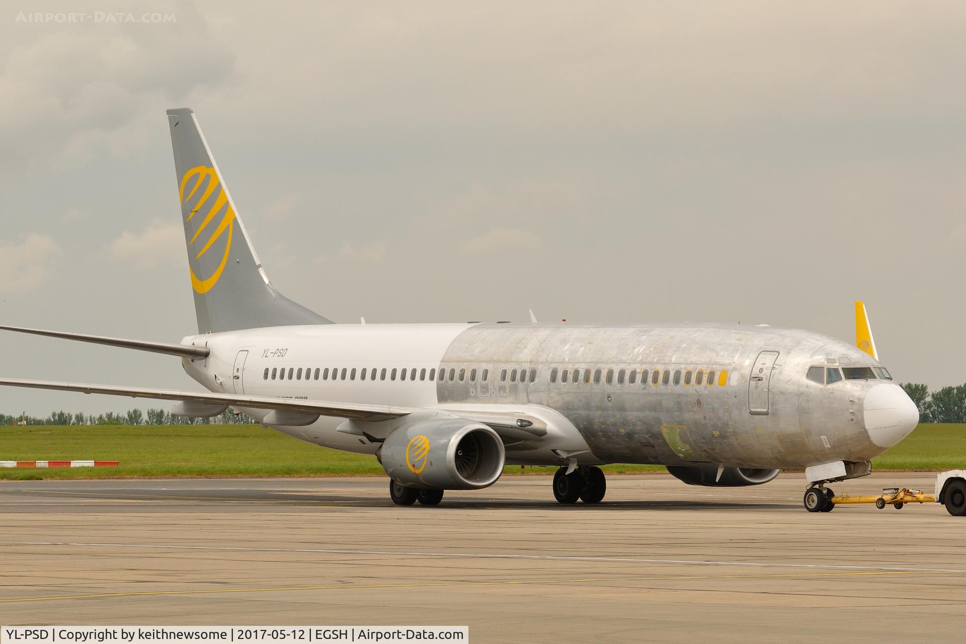 YL-PSD, 2000 Boeing 737-86N C/N 28618, Towed from storage area to maintenance.