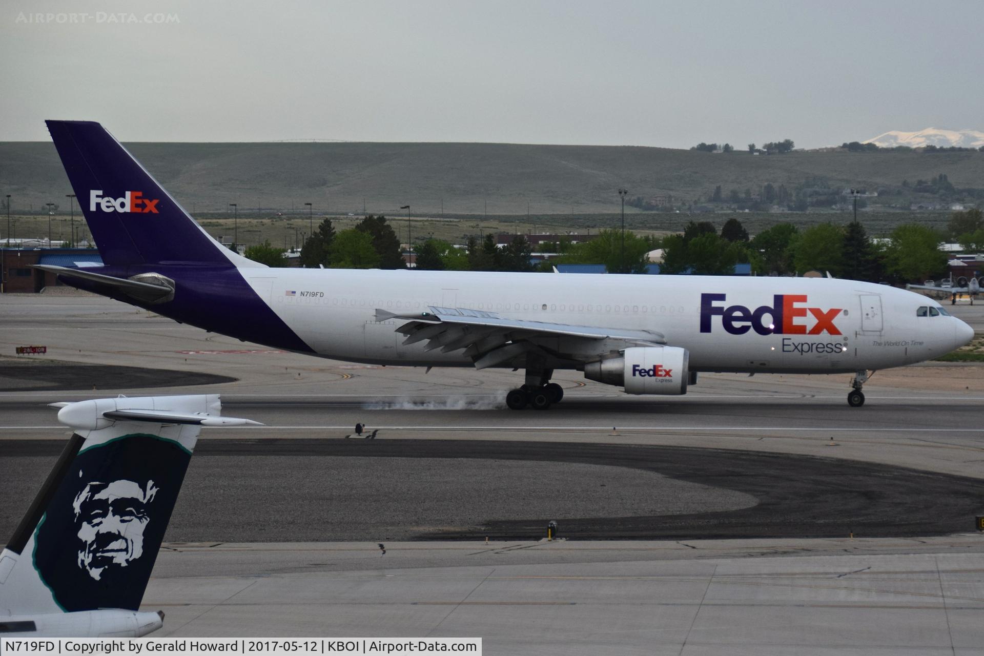 N719FD, 1989 Airbus A300B4-622 C/N 388, Leaving a little bit of brake smoke trying to slow for Taxiway Echo.