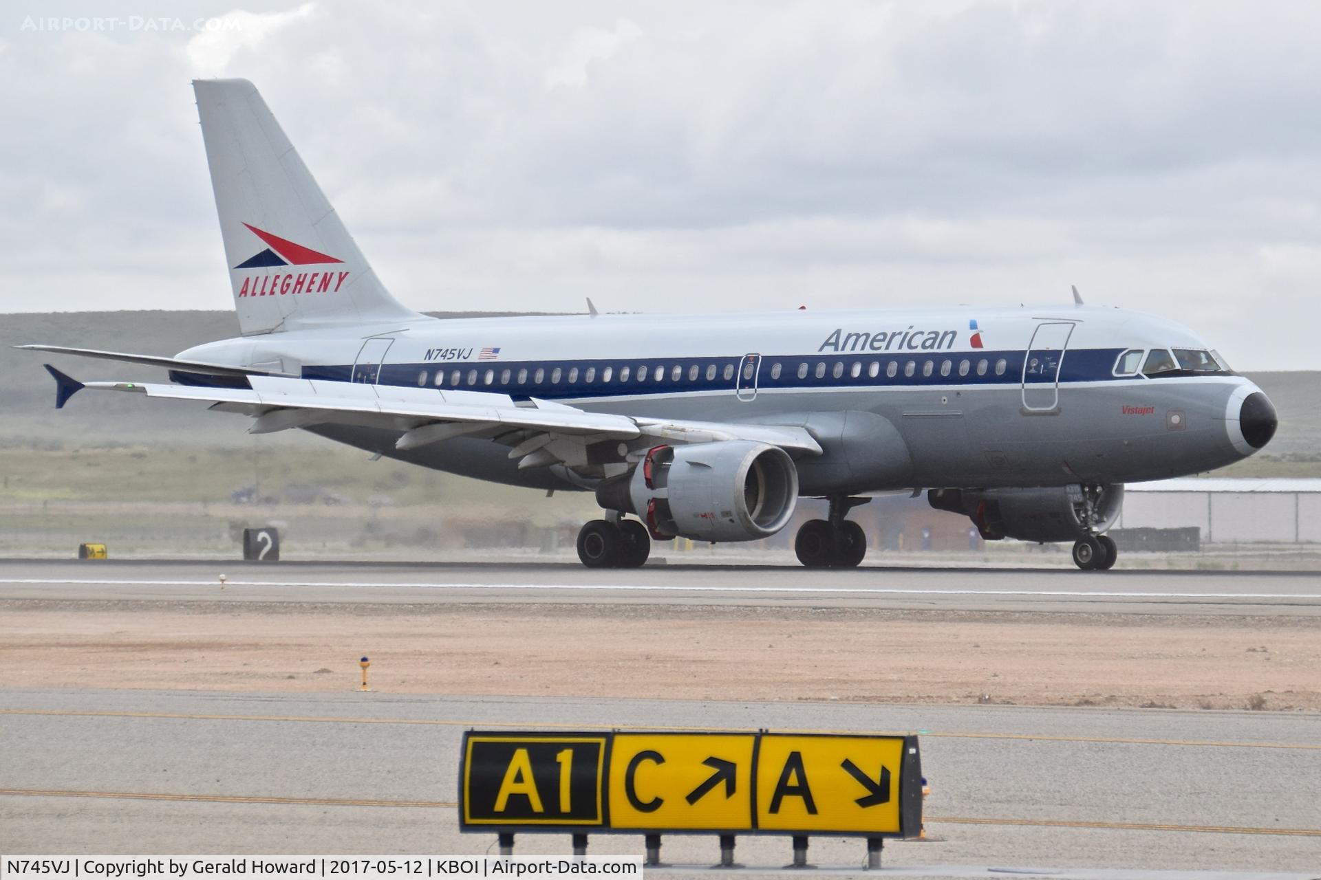 N745VJ, 2000 Airbus A319-112 C/N 1289, Landing roll out on RWY 28R with full reverse thrusters.