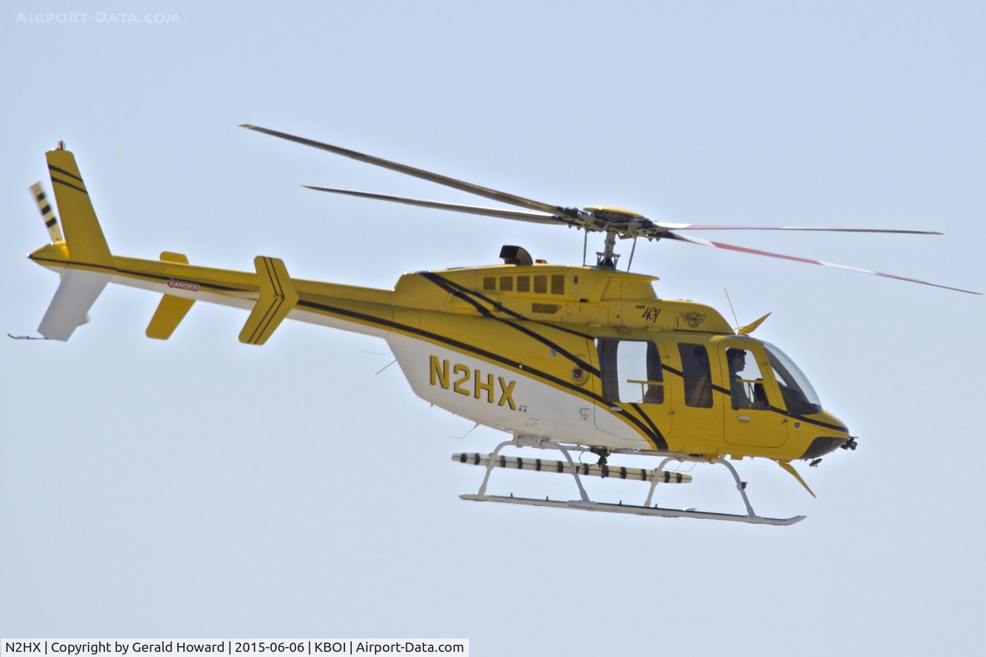 N2HX, 2000 Bell 407 C/N 53466, Departing the east end of BOI.