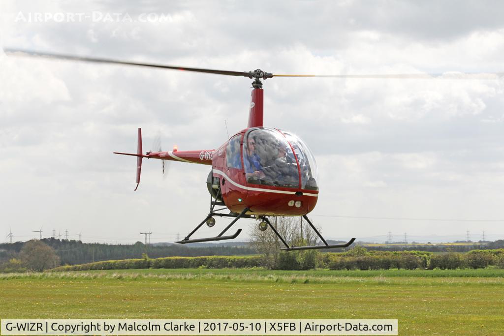G-WIZR, 1998 Robinson R22 Beta II C/N 2799, Robinson R22 Beta II at Fishburn Airfield UK. May 10th 2017.