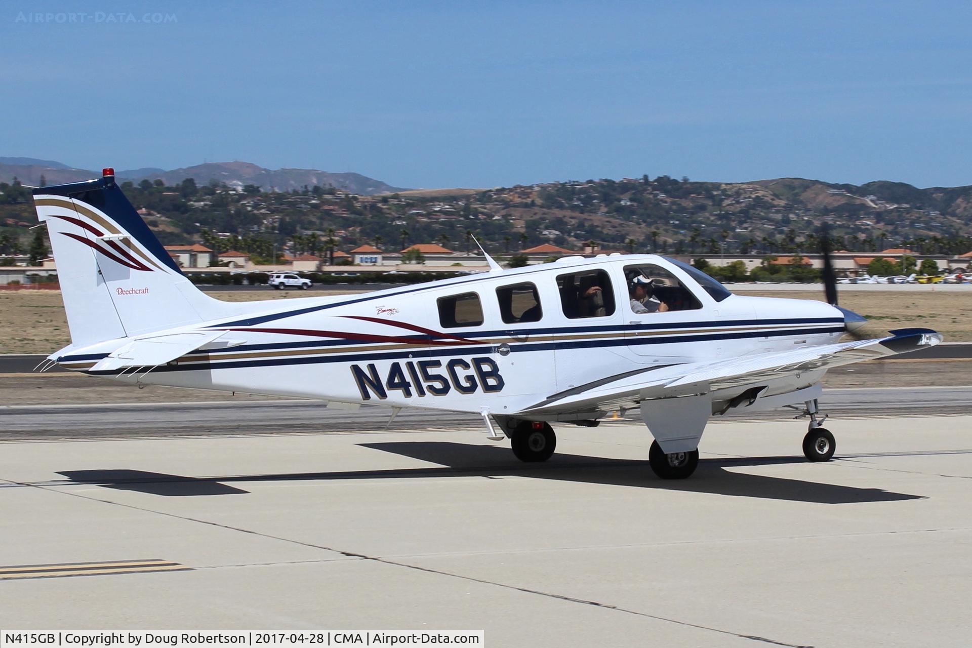 N415GB, 2000 Raytheon Aircraft Company A36 Bonanza C/N E-3363, 2000 Raytheon Beech A36 Bonanza, Continental IO-550-B 300 Hp, taxi to overflow parking area. At AOPA FLY-IN.