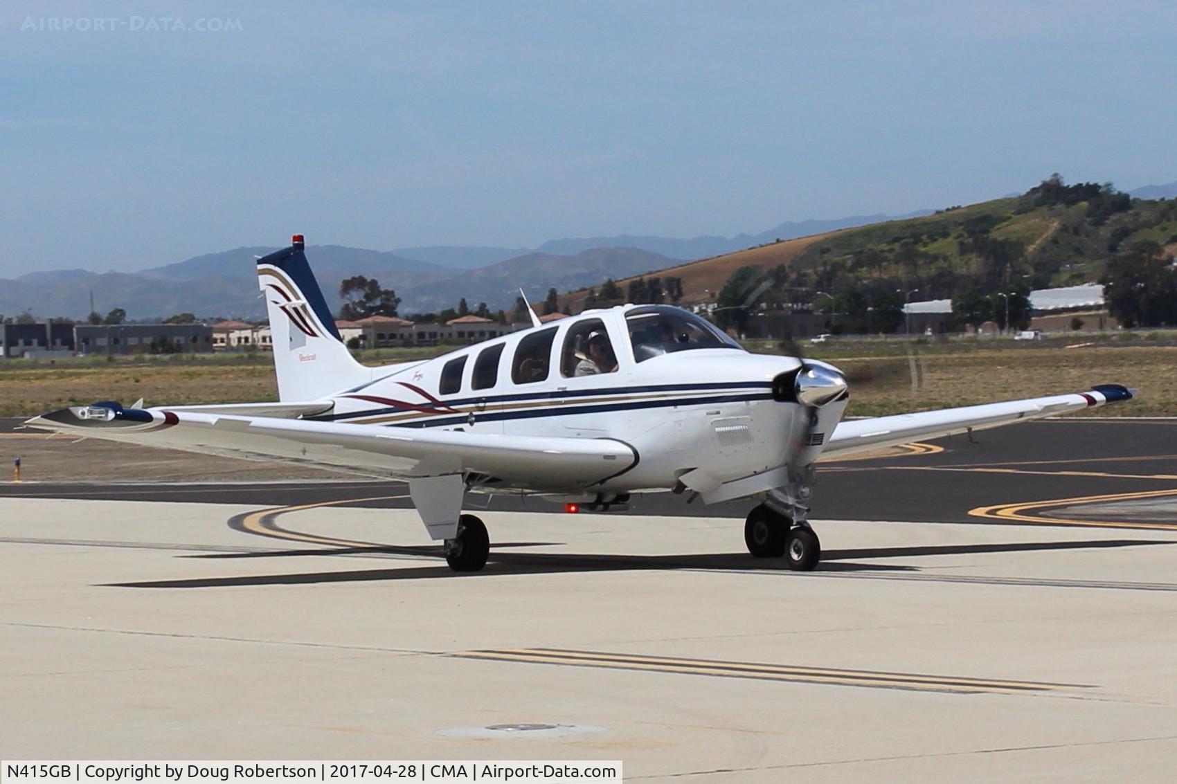 N415GB, 2000 Raytheon Aircraft Company A36 Bonanza C/N E-3363, 2000 Raytheon Beech A36 BONANZA, Continental IO-550-B 300 Hp, taxi  to overflow parking area. At AOPA FLY-IN.