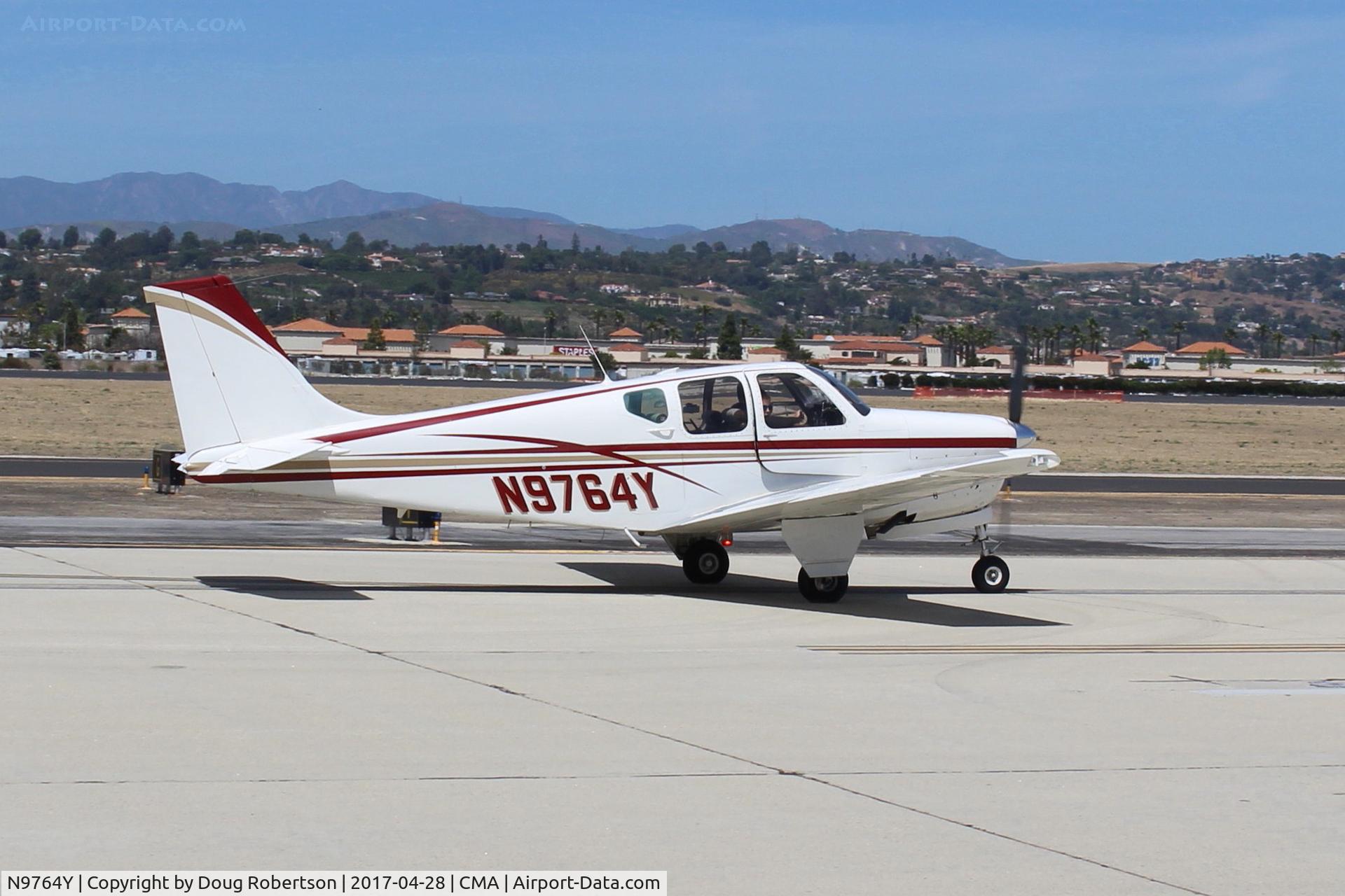 N9764Y, 1963 Beech 35-B33 Debonair C/N CD-616, 1963 Beech 35-B33 DEBONAIR, Continental IO-470-J 225 Hp, taxi to overflow parking area, AOPA FLY-IN