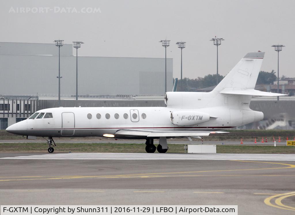 F-GXTM, 1986 Dassault Falcon 50 C/N 165, Taxiing to the General Aviation area...