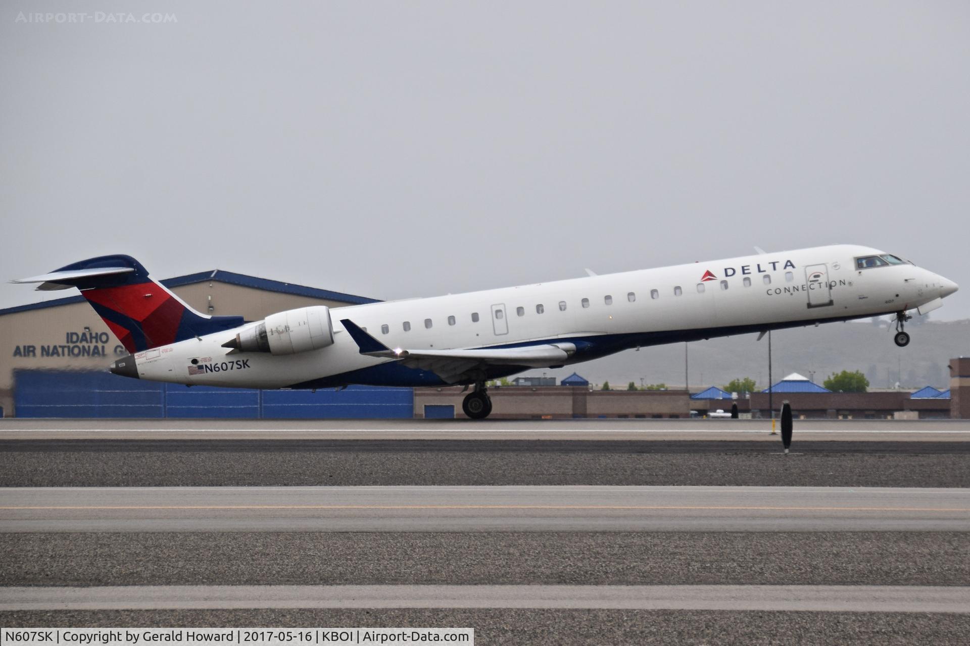 N607SK, 2006 Bombardier CRJ-702 (CL-600-2C10) Regional Jet C/N 10251, Departing RWY 28R.