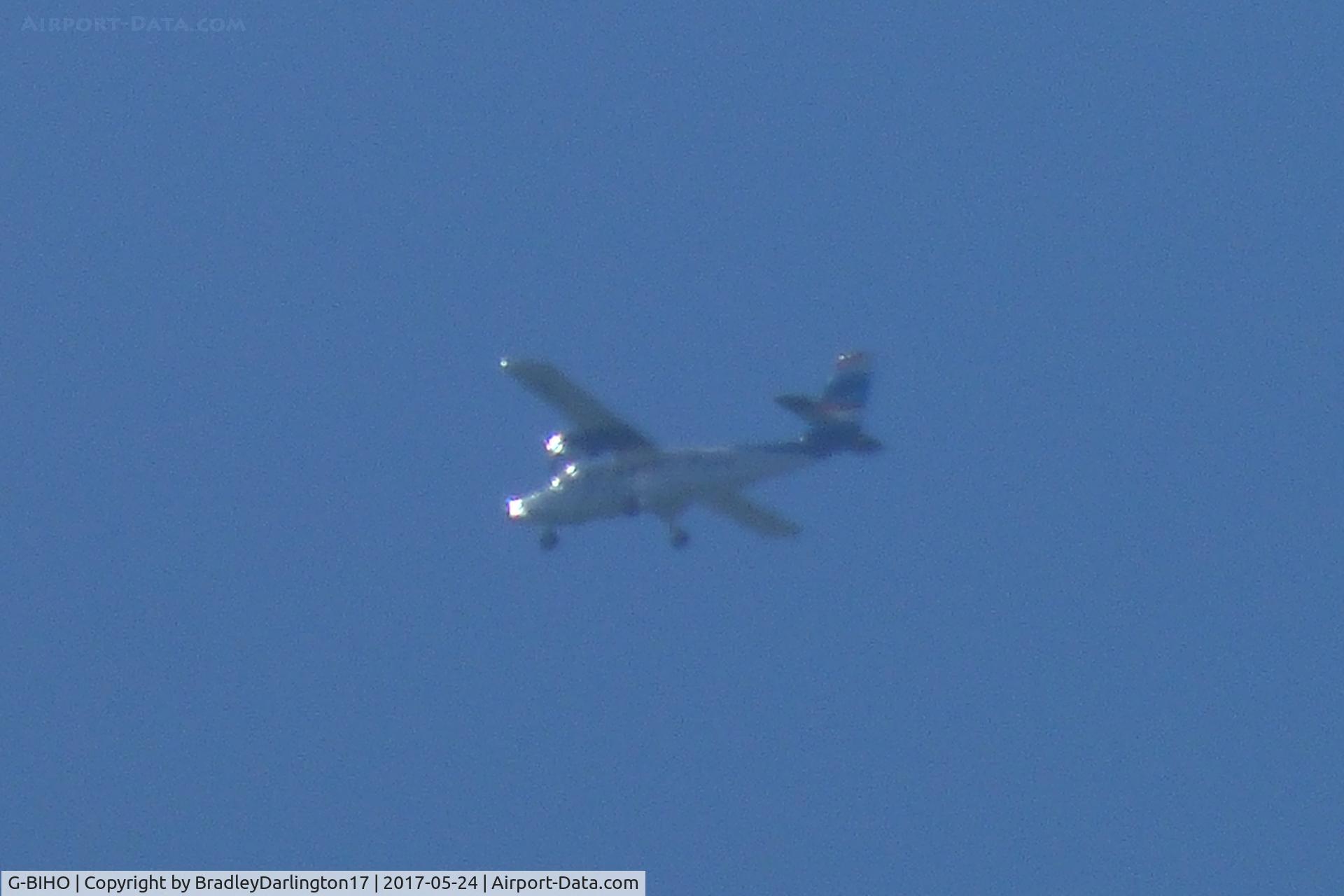 G-BIHO, 1981 De Havilland Canada DHC-6-310 Twin Otter C/N 738, flying over plymouth on a sunny afternoon