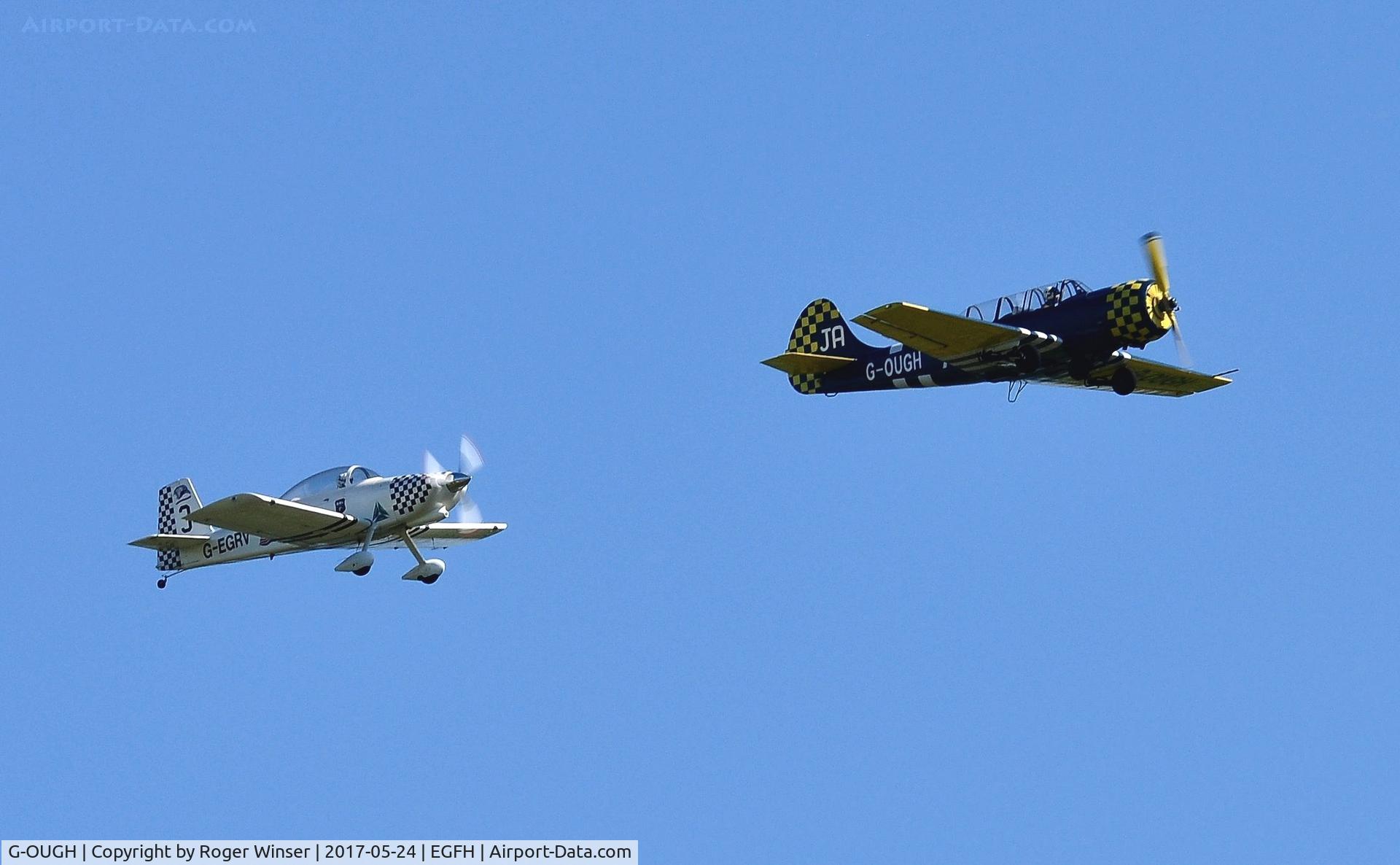 G-OUGH, 1987 Bacau Yak-52 C/N 877404, Osprey formation. G-OUGH leading Raven 3 in a run and break over Runway 28.