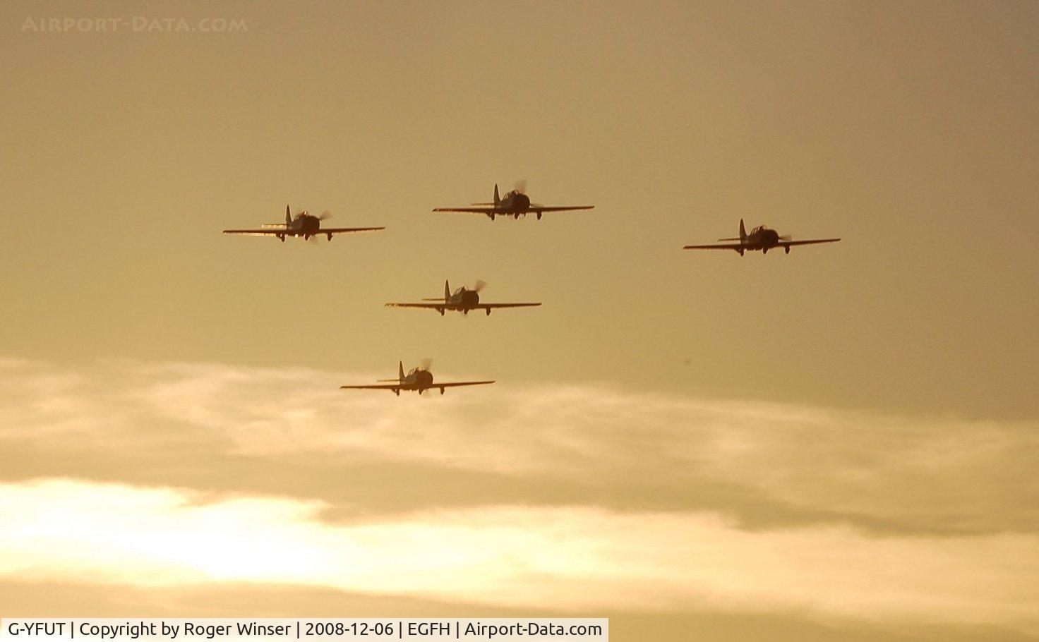 G-YFUT, 1988 Bacau Yak-52 C/N 888410, Leading the newly formed Team Osprey after gaining Display Authorisation. G-FLSH at the rear of the formation.