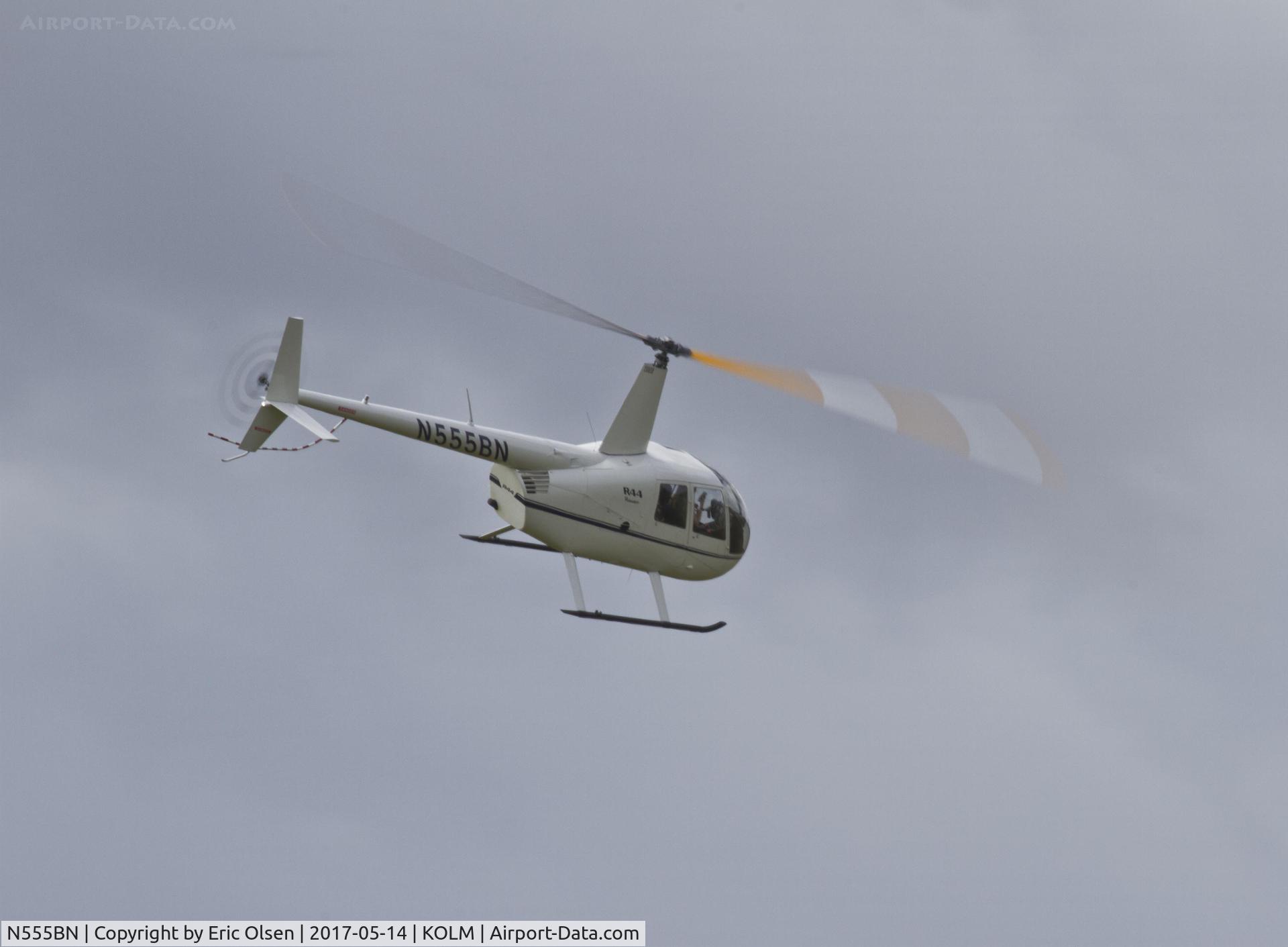 N555BN, 2001 Robinson R44 C/N 1079, Robinson R44 passing over the Olympia Airport