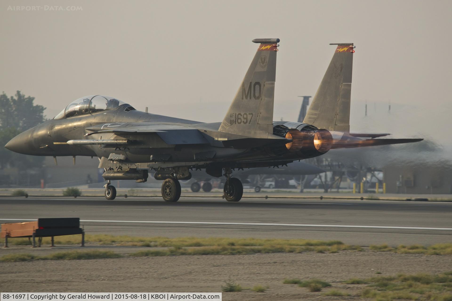 88-1697, 1988 McDonnell Douglas F-15E Strike Eagle C/N 1106/E081, Take off roll on RWY 10R on a smoky day.  389th Fighter Sq. 