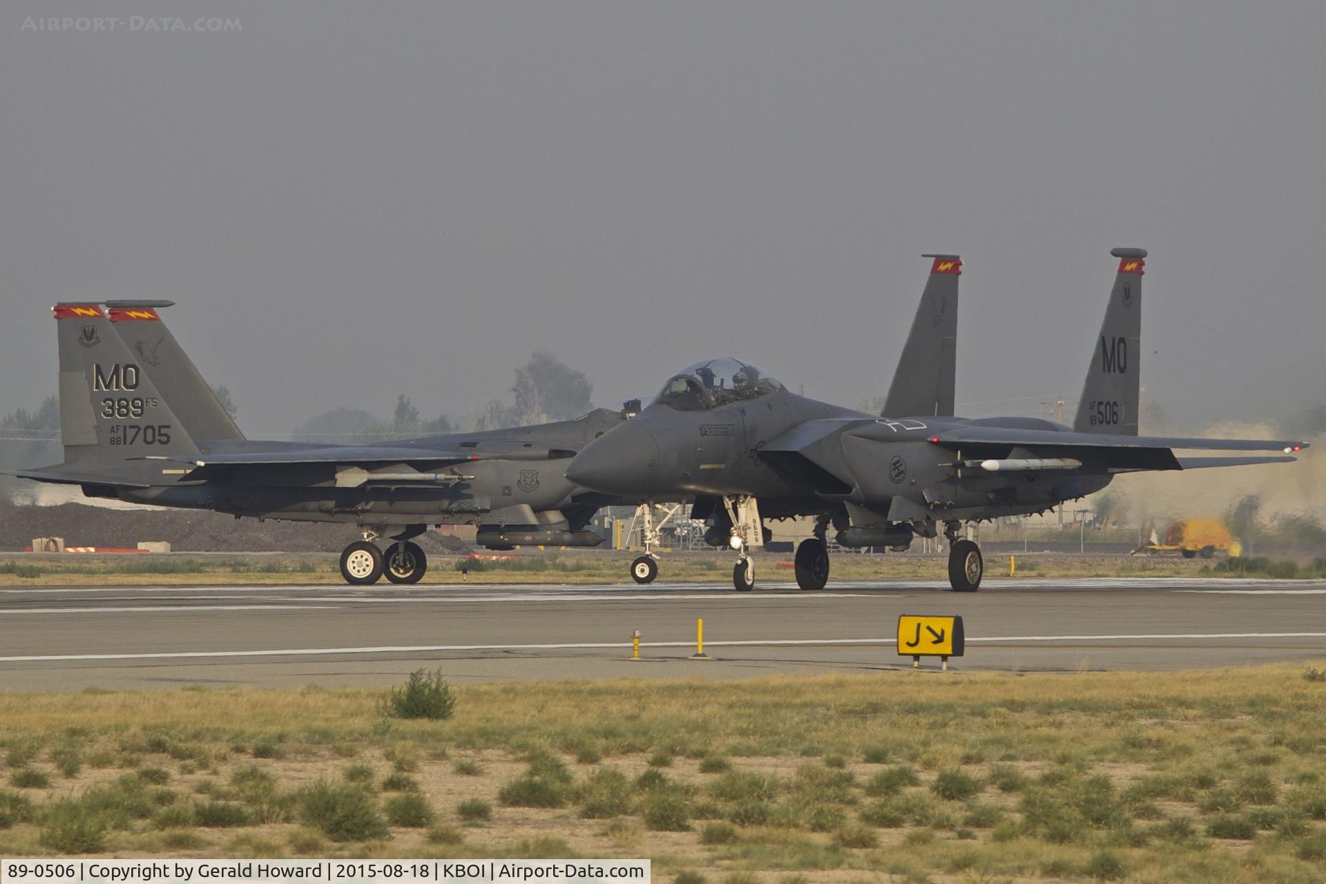 89-0506, 1989 McDonnell Douglas F-15E Strike Eagle C/N 1153/E128, On RWY 10R with 88-1705 behind.  Both from the 389th Fighter Sq. 