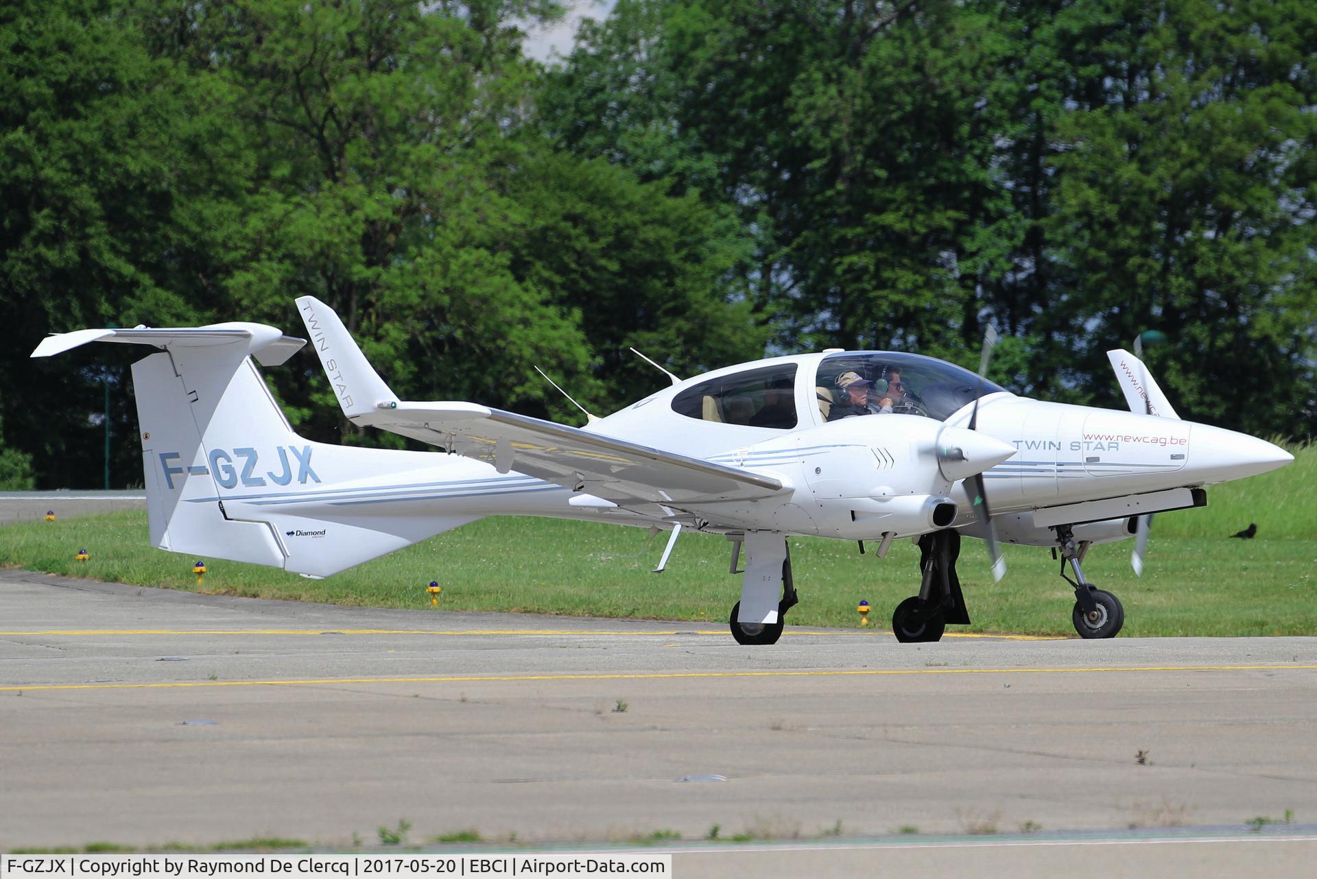 F-GZJX, Diamond DA-42 Twin Star C/N 42.024, New CAG flight school at Gosselies.