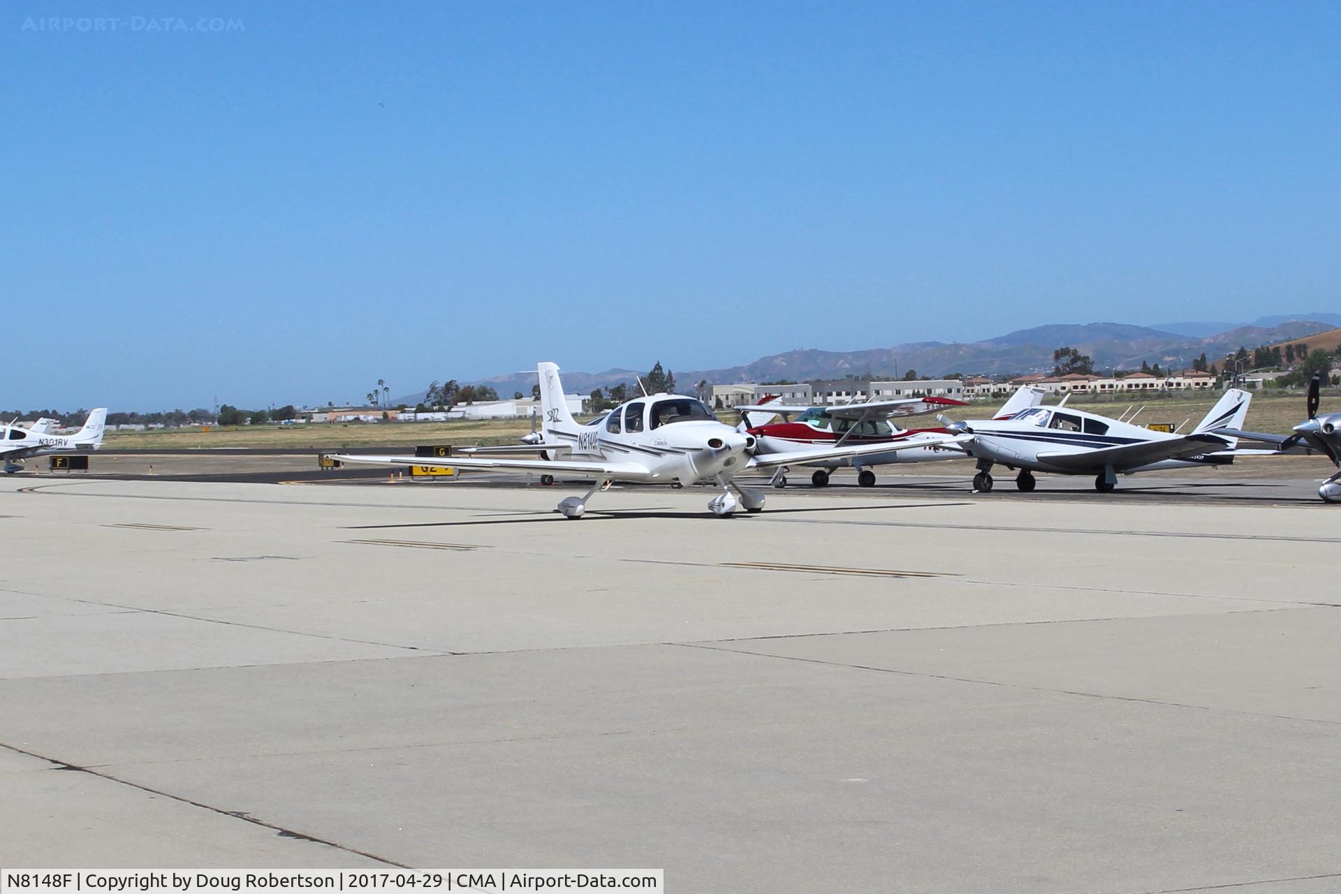 N8148F, 2003 Cirrus SR22 C/N 0769, 2003 Cirrus SR22, Continental IO-550-N 310 Hp, taxi to overflow parking area, at AOPA FLY-IN