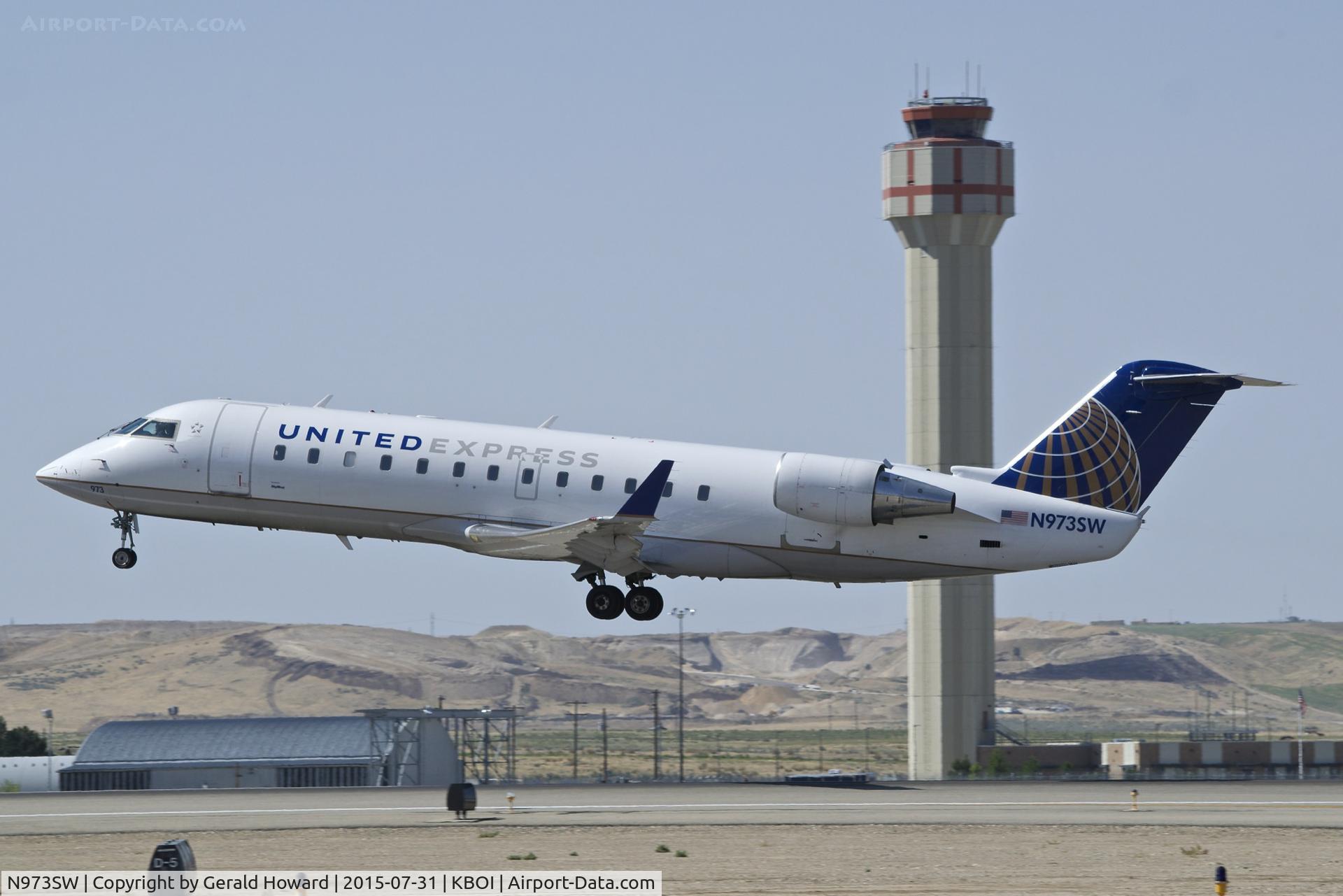 N973SW, 2004 Bombardier CRJ-200ER (CL-600-2B19) C/N 7949, Take off from RWY 10L.