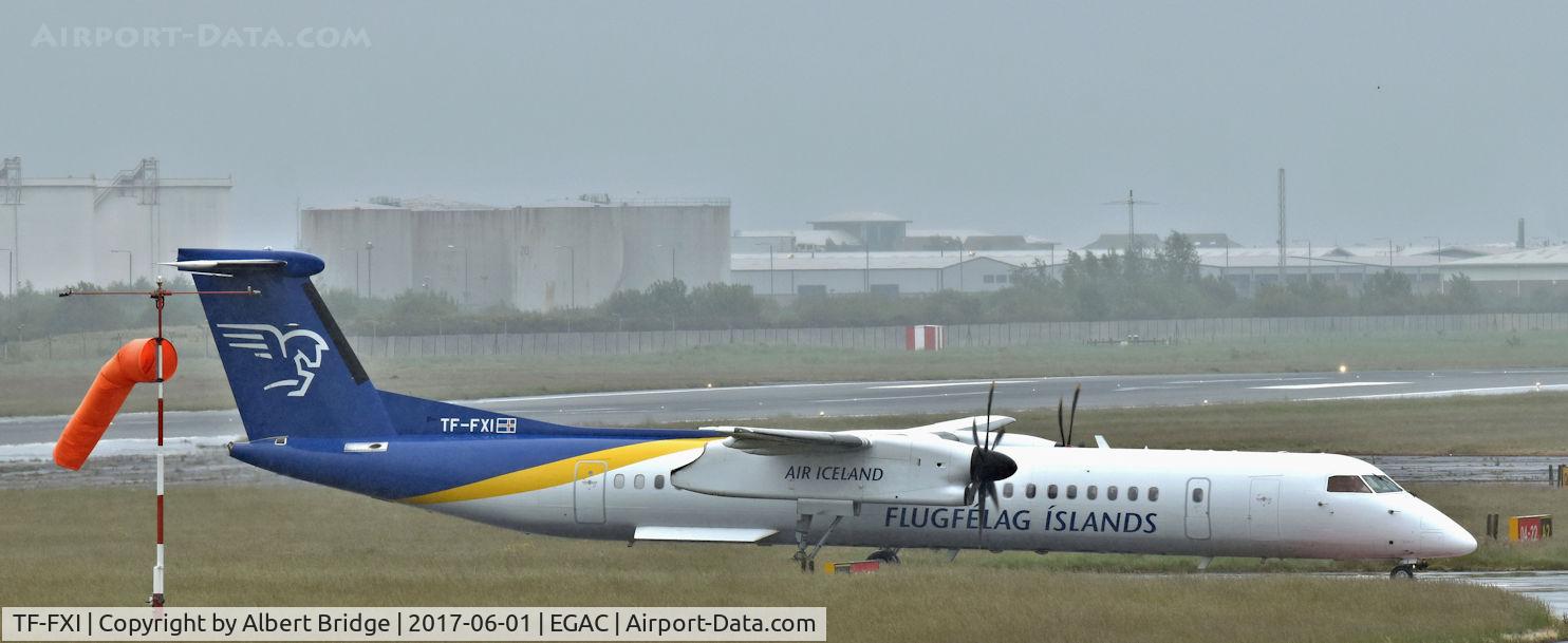TF-FXI, 2000 De Havilland Canada DHC-8-402Q Dash 8 C/N 4033, Air Iceland Connect Dash 8 TF-FXI arriving at a very wet Belfast City with the first flight from Keflavík.