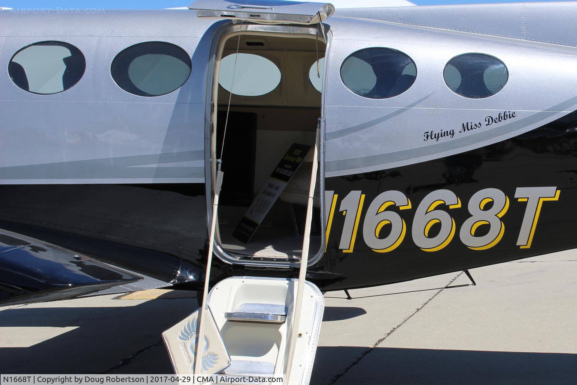 N1668T, 1973 Cessna 414 Chancellor C/N 414-0461, 1973 CESSNA 414, two Continental TSIO-520B 310 Hp each, pressurized, tip tanks, airstair door, at AOPA FLY-IN