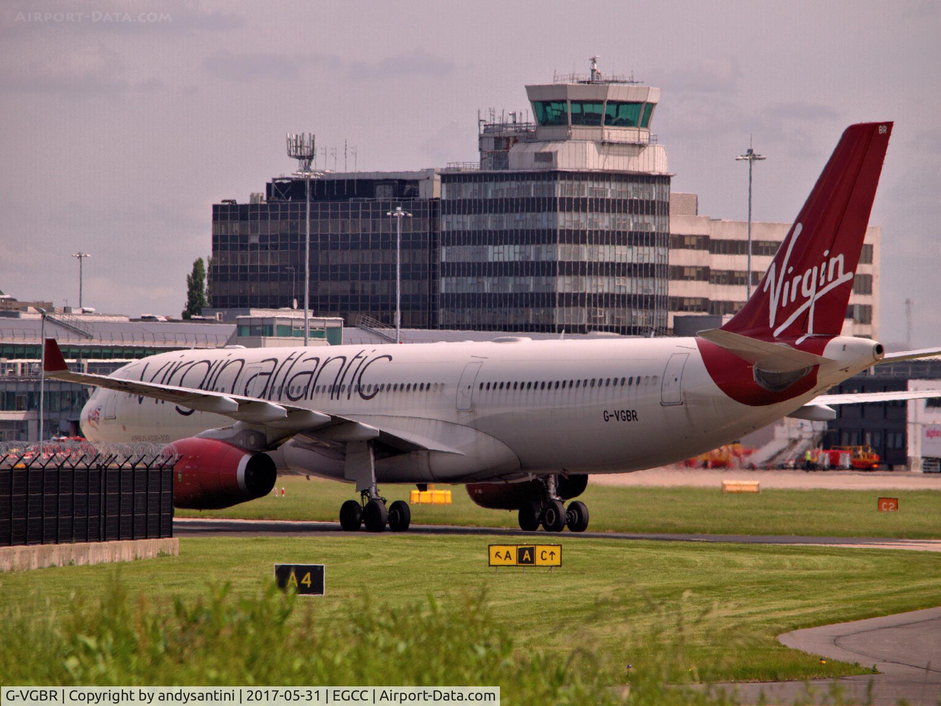 G-VGBR, 2012 Airbus A330-343X C/N 1329, taxing round to its stand/gate man egcc uk