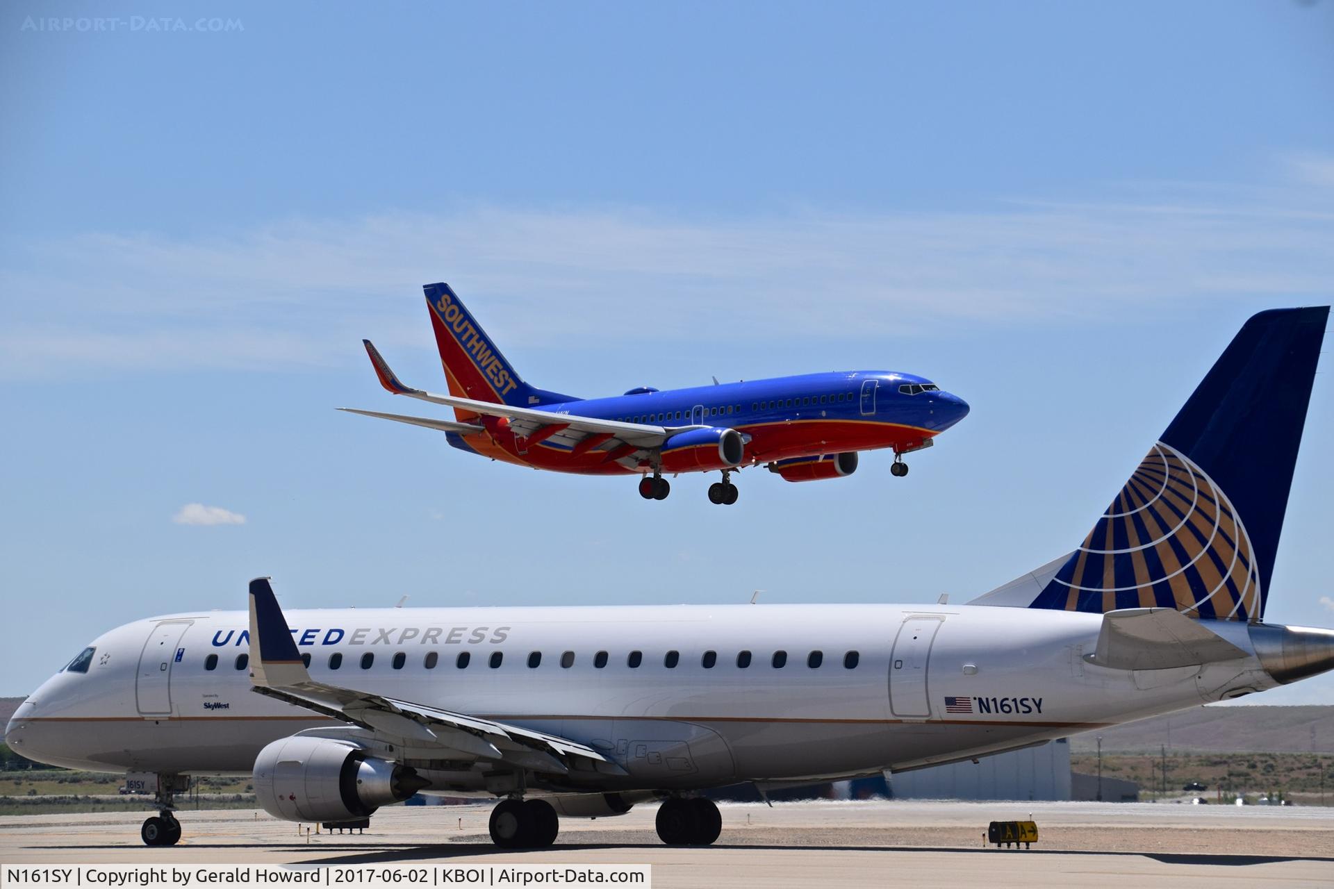 N161SY, 2016 Embraer 175LR (ERJ-170-200LR) C/N 17000569, Stopped on Alpha waiting for Southwest, N494WN, to land.