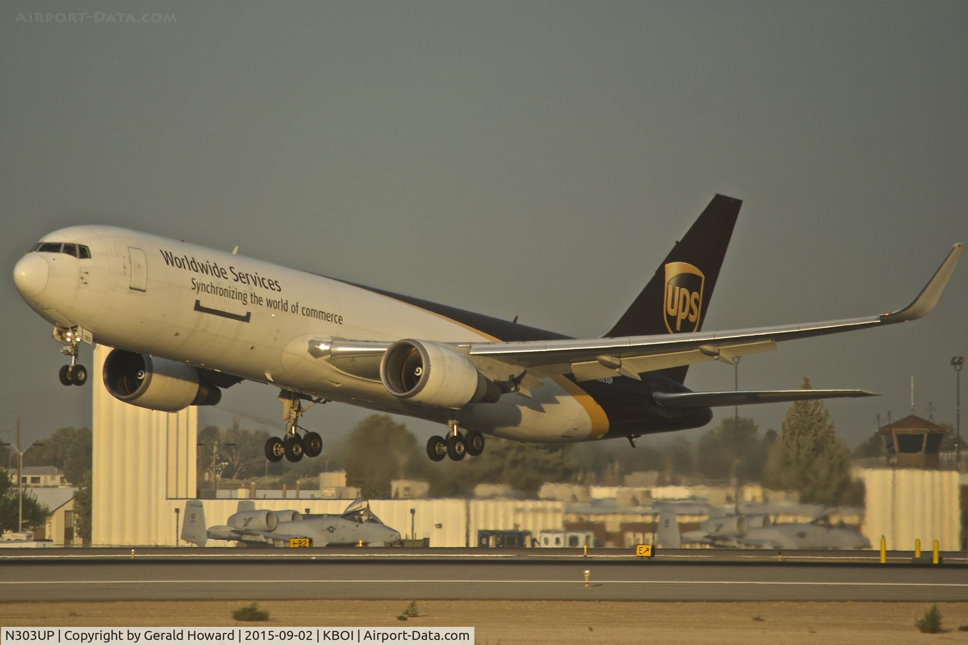 N303UP, 1995 Boeing 767-34AF C/N 27241, Lift off from RWY 10R.