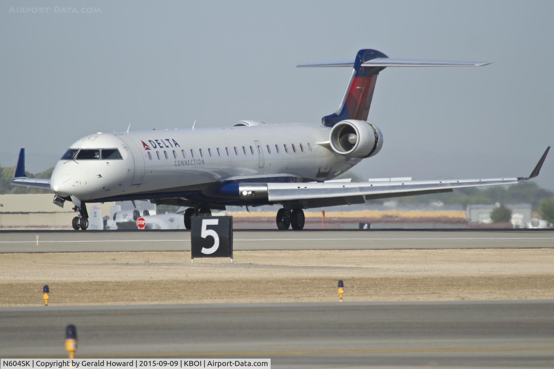 N604SK, 2006 Bombardier CRJ-702 (CL-600-2C10) Regional Jet C/N 10249, Landing RWY 10L.