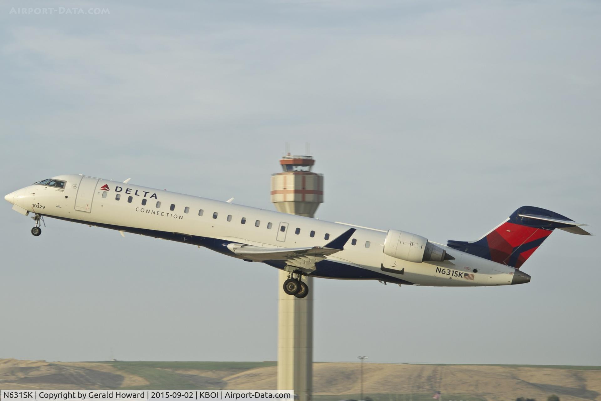 N631SK, 2011 Bombardier CRJ-700 (CL-600-2C10) Regional Jet C/N 10329, Departing BOI.