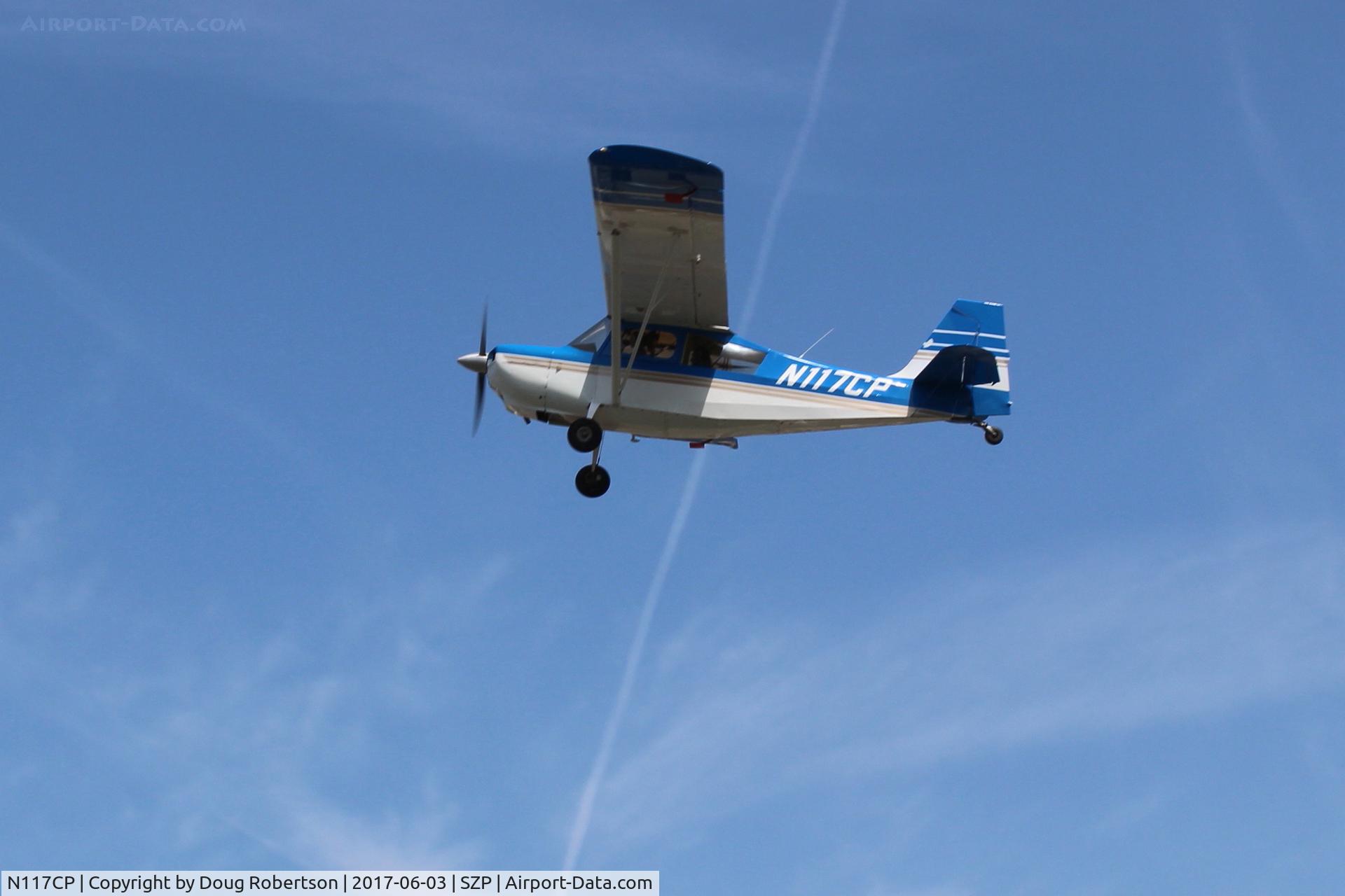 N117CP, American Champion 7GCBC Citabria C/N 1275-99, 1999 American  Champion 7GCBC CITABRIA, Lycoming O-320 150 Hp, takeoff climb Rwy 22. Red aileron spades have been added to this aircraft. Look closely to see. 