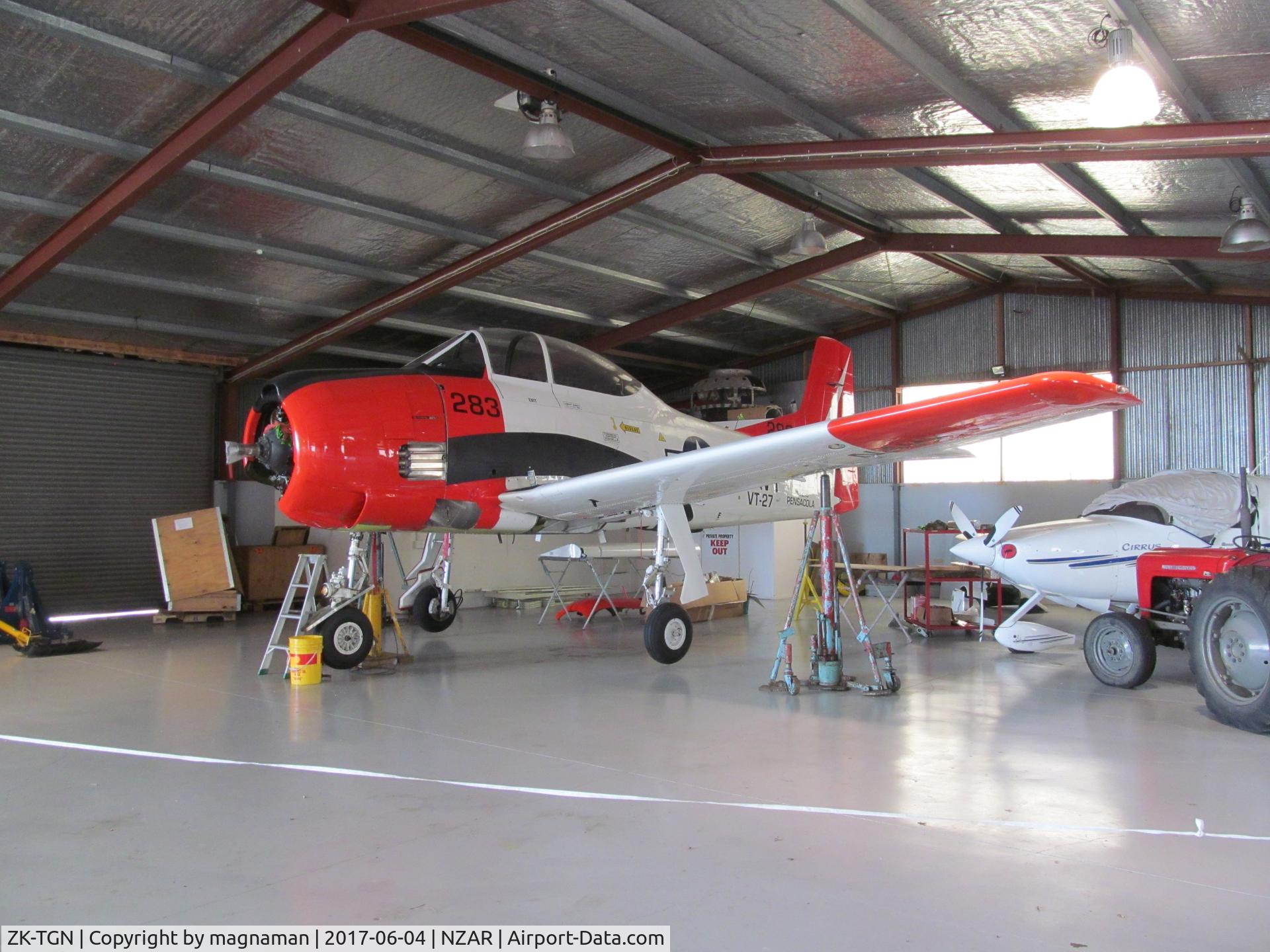ZK-TGN, 1954 North American T-28B Trojan C/N 200-289, still under repair following u/c collapse