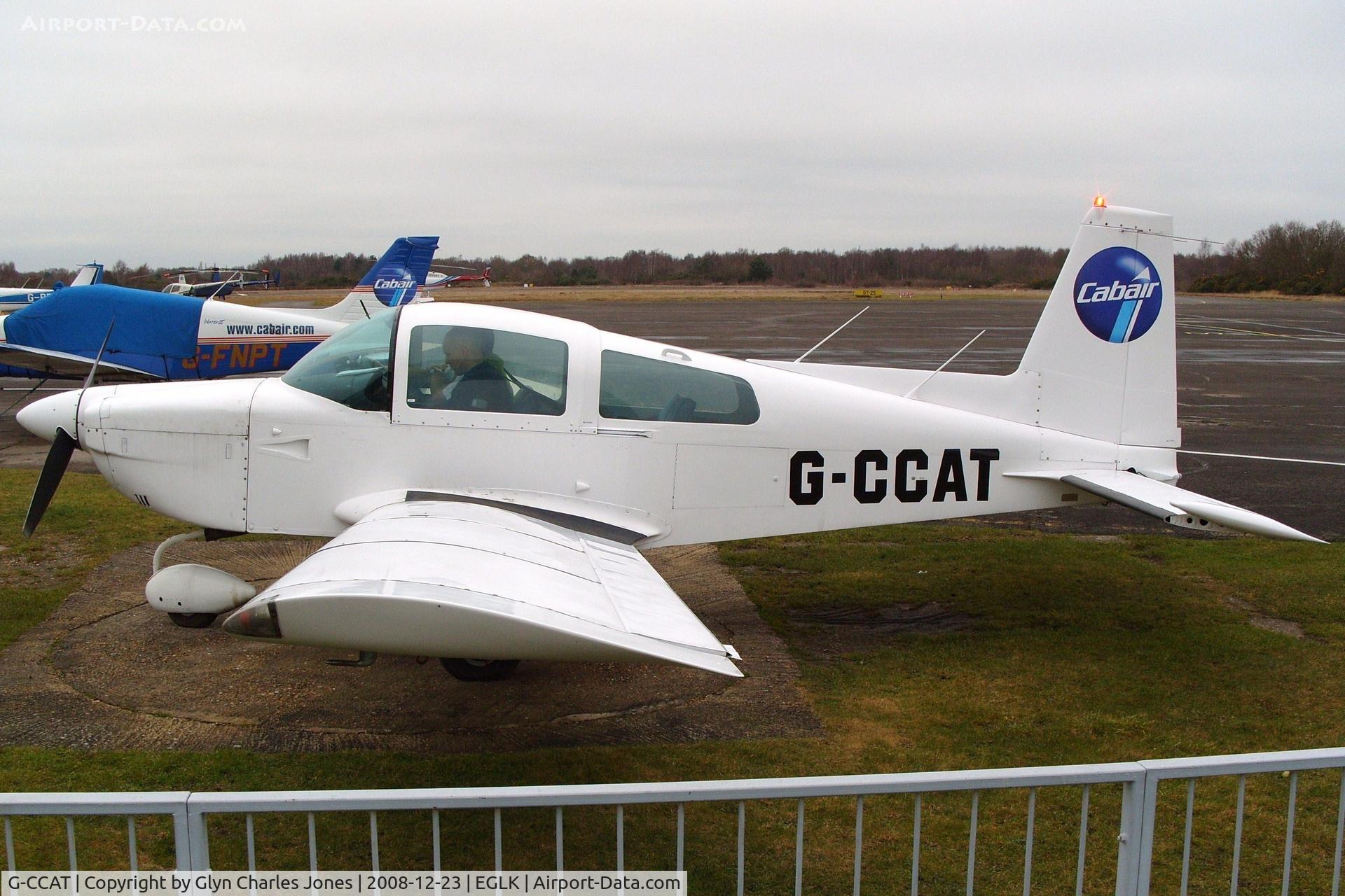 G-CCAT, 1979 Gulfstream American AA-5A Cheetah C/N AA5A-0893, Previously G-OAJH, G-KILT and G-BJFA. Quite a British history for this little Cheetah. Parked next to the fence. Getting ready for another training flight. Operated by Cabair.