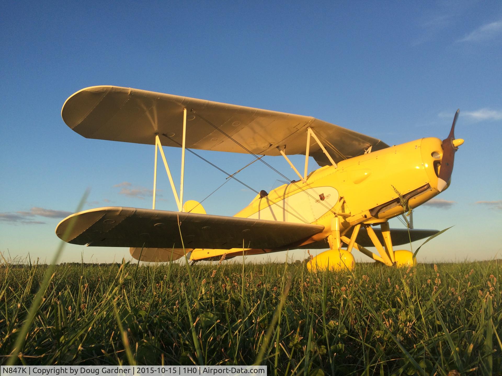 N847K, 1983 Great Lakes 2T-1A Sport Trainer C/N 1, N847K resting in the grass at her home field.