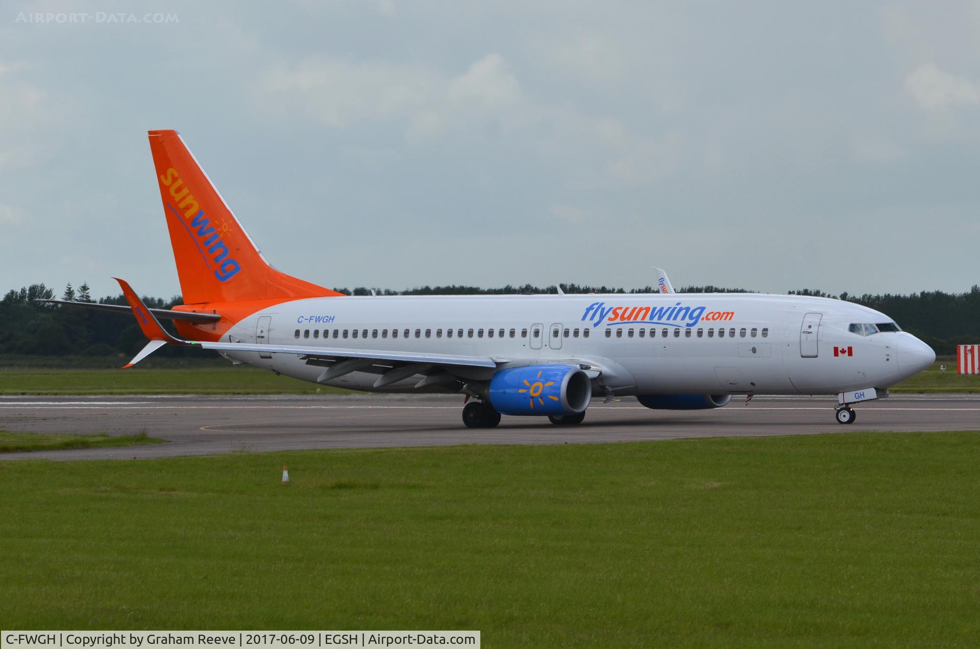 C-FWGH, 2011 Boeing 737-86J C/N 37752, About to depart from Norwich.