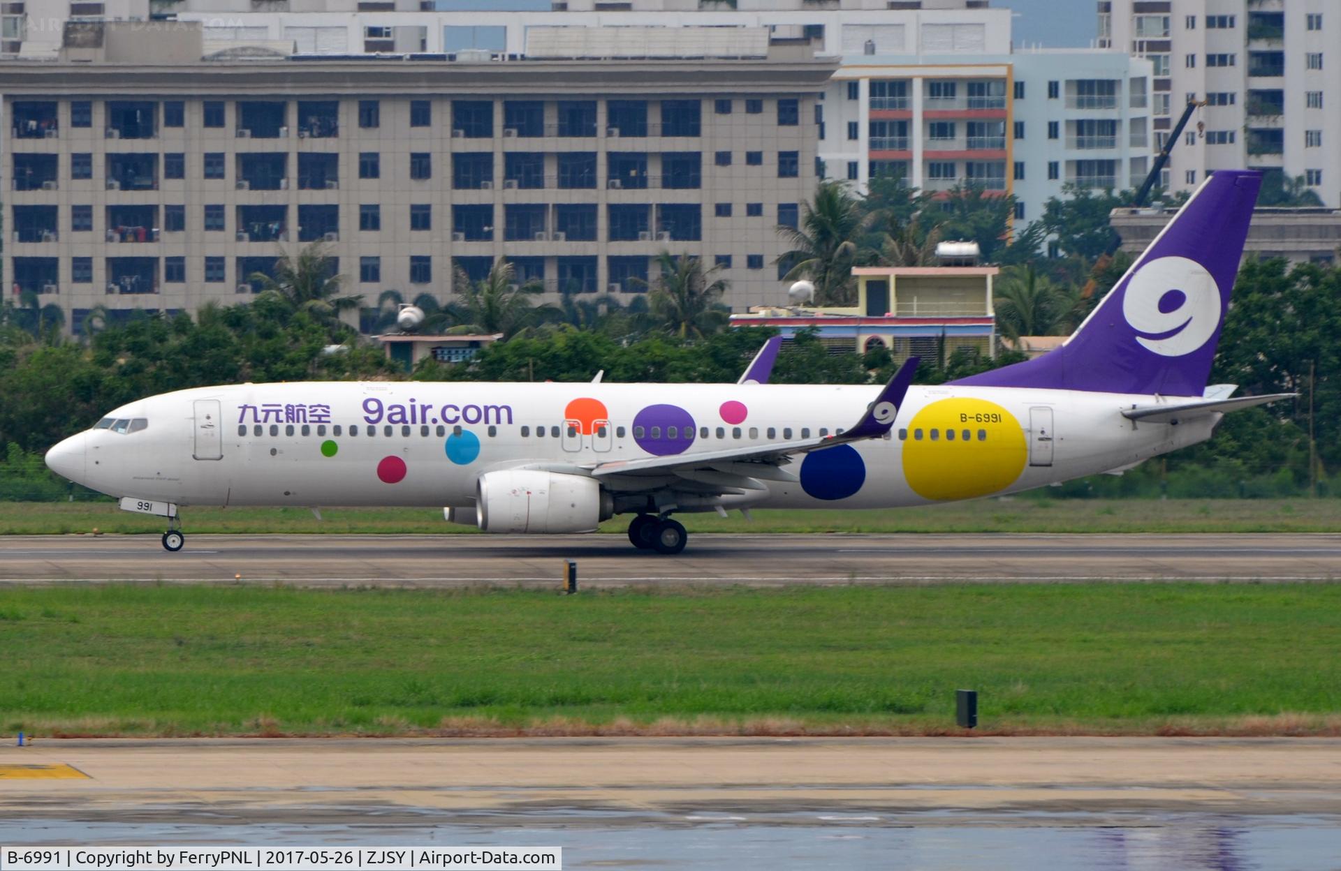 B-6991, 2013 Boeing 737-86N C/N 41260, 9 Air B738 departing SYX