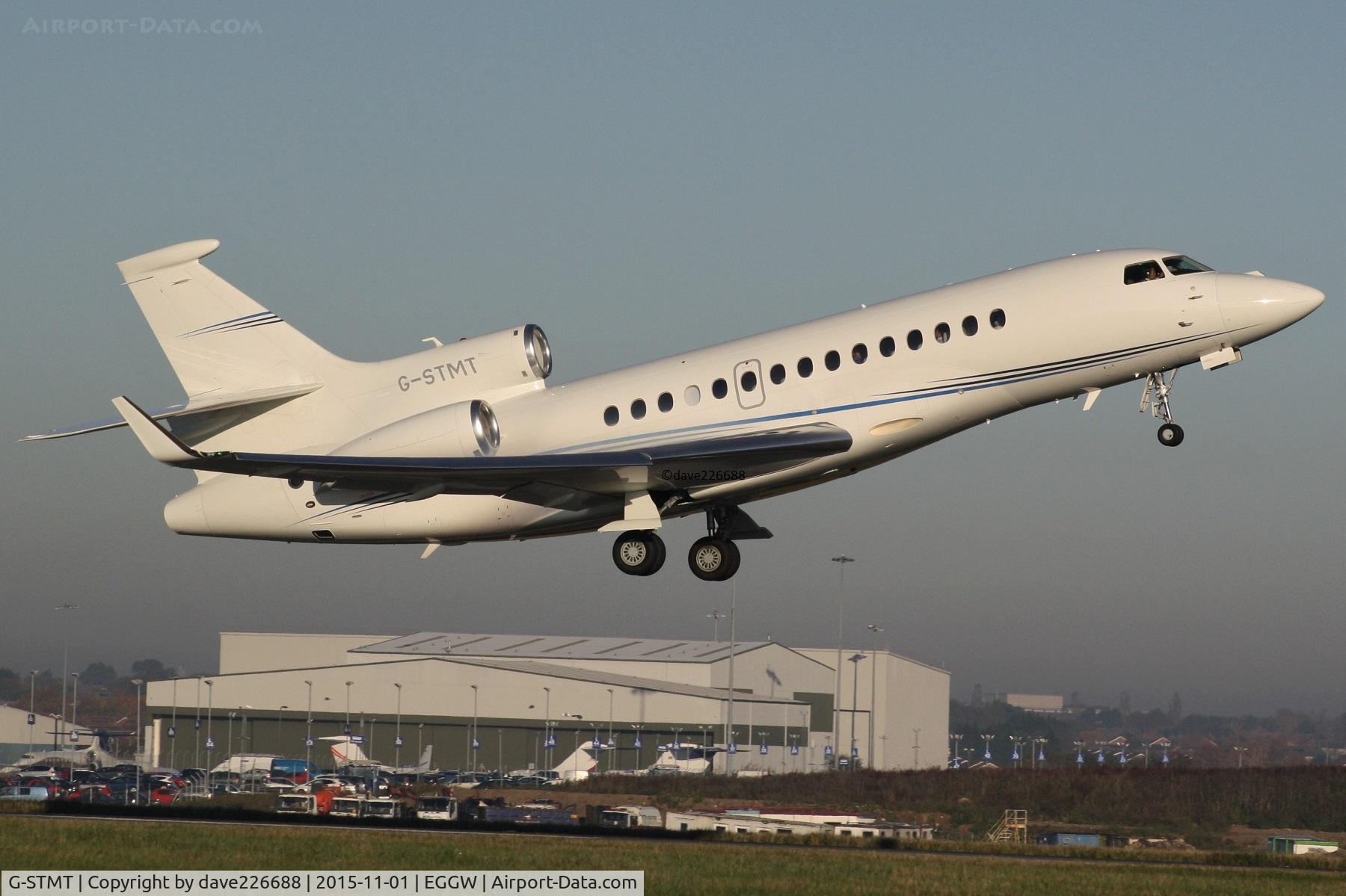 G-STMT, 2011 Dassault Falcon 7X C/N 148, G STMT takeoff on 08 at London Luton