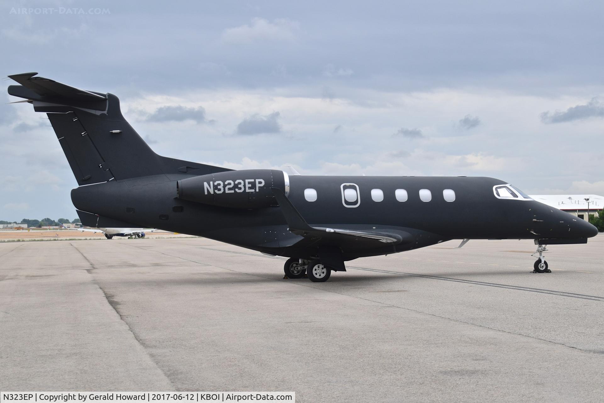 N323EP, 2012 Embraer EMB-505 Phenom 300 C/N 50500102, Parked on north GA ramp.