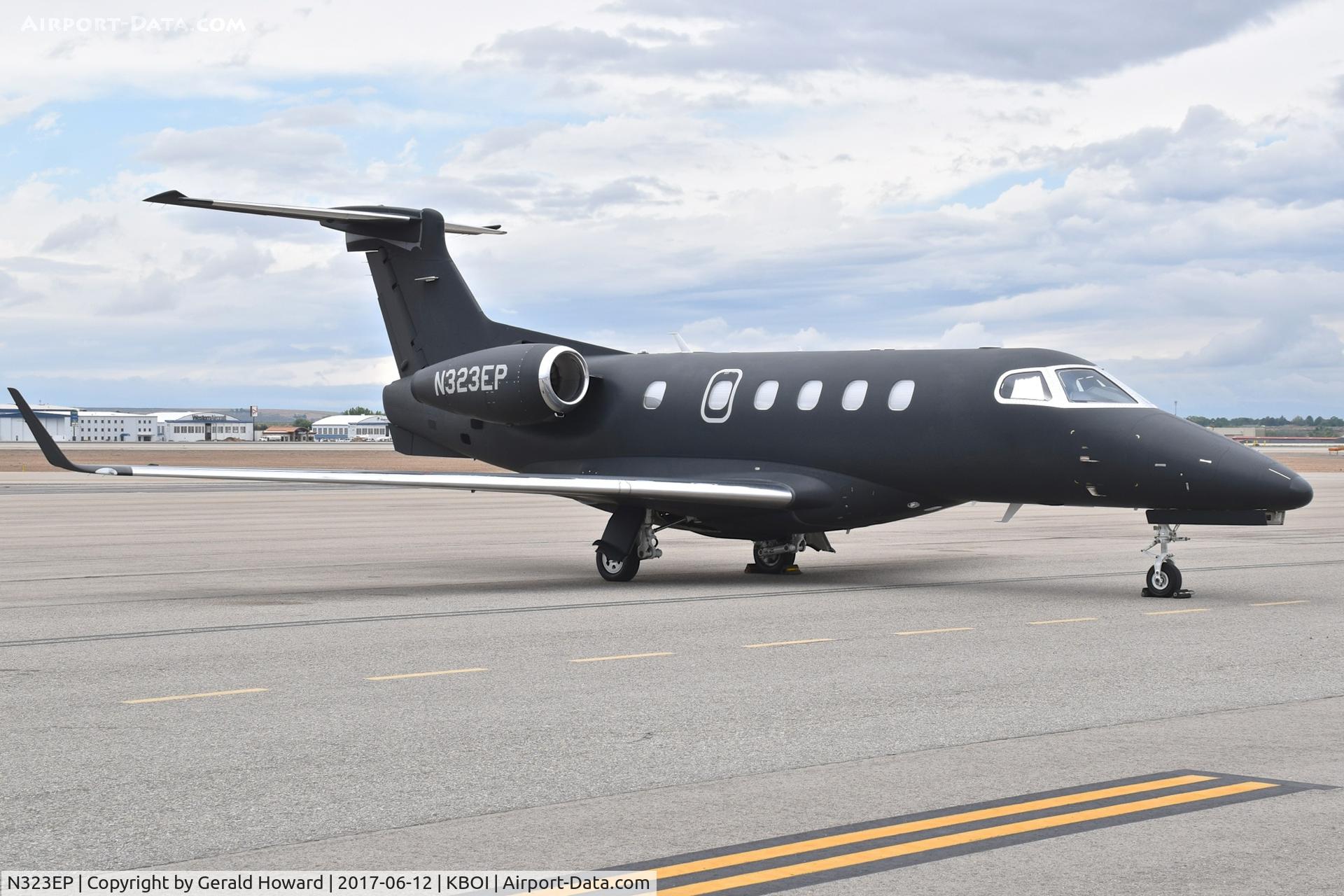 N323EP, 2012 Embraer EMB-505 Phenom 300 C/N 50500102, Parked on the north GA ramp.