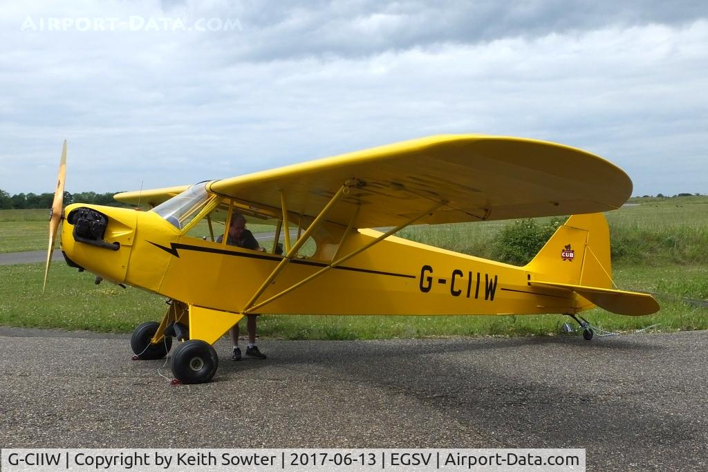 G-CIIW, 1939 Piper J3L-65 Cub C/N 3372, Preparing for another flight