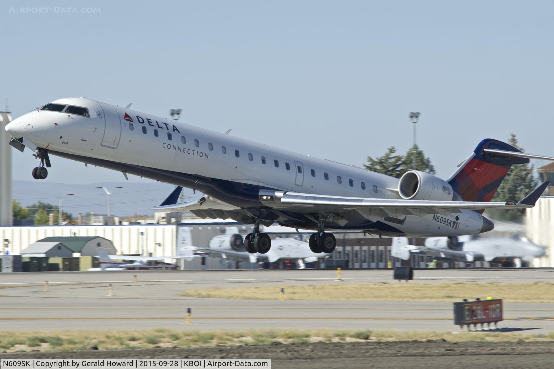 N609SK, 2002 Bombardier CRJ-701 (CL-600-2C10) Regional Jet C/N 10020, Take off from RWY 10R.