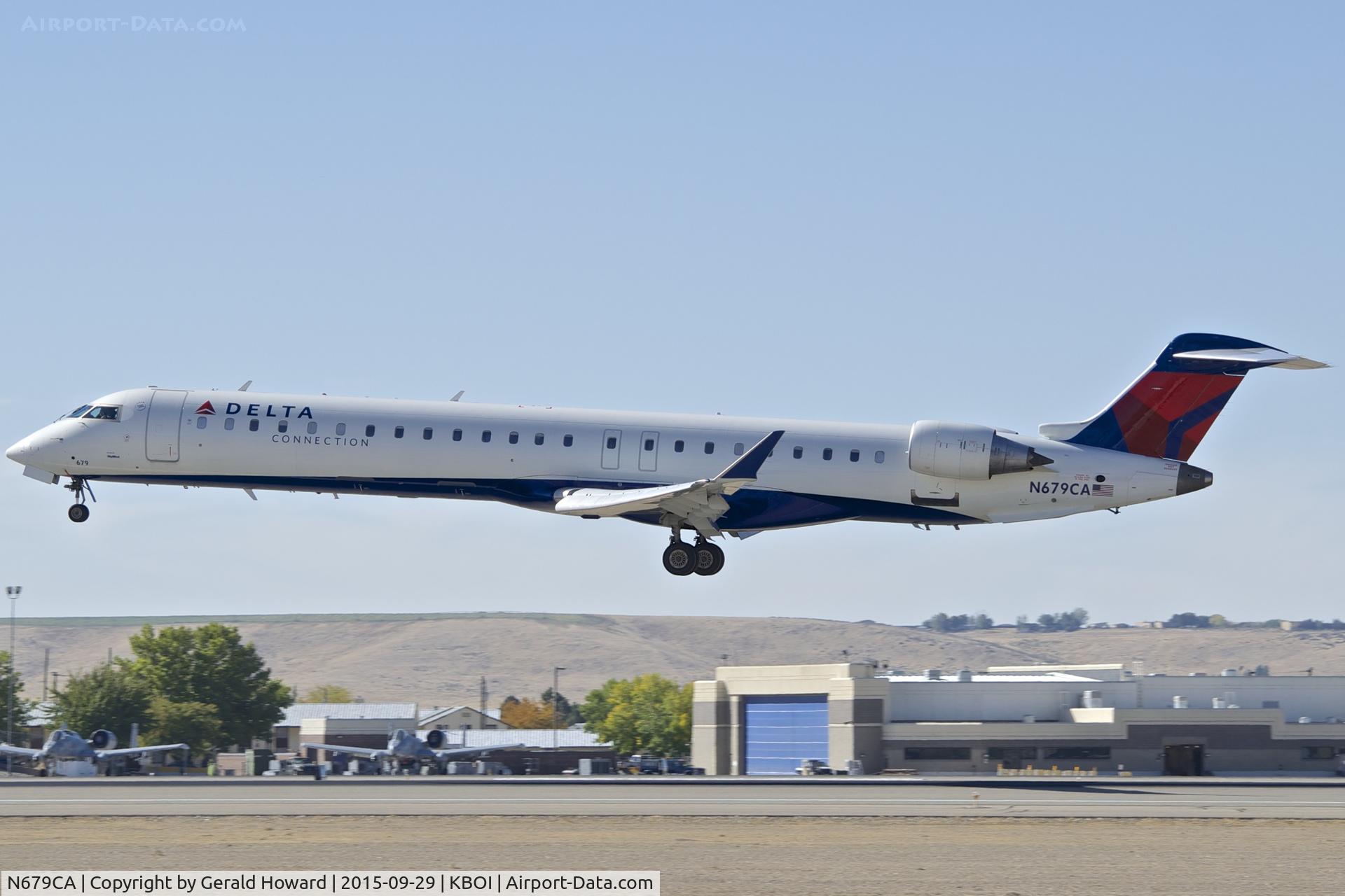 N679CA, 2007 Bombardier CRJ-900ER (CL-600-2D24) C/N 15132, Landing RWY 10L.
