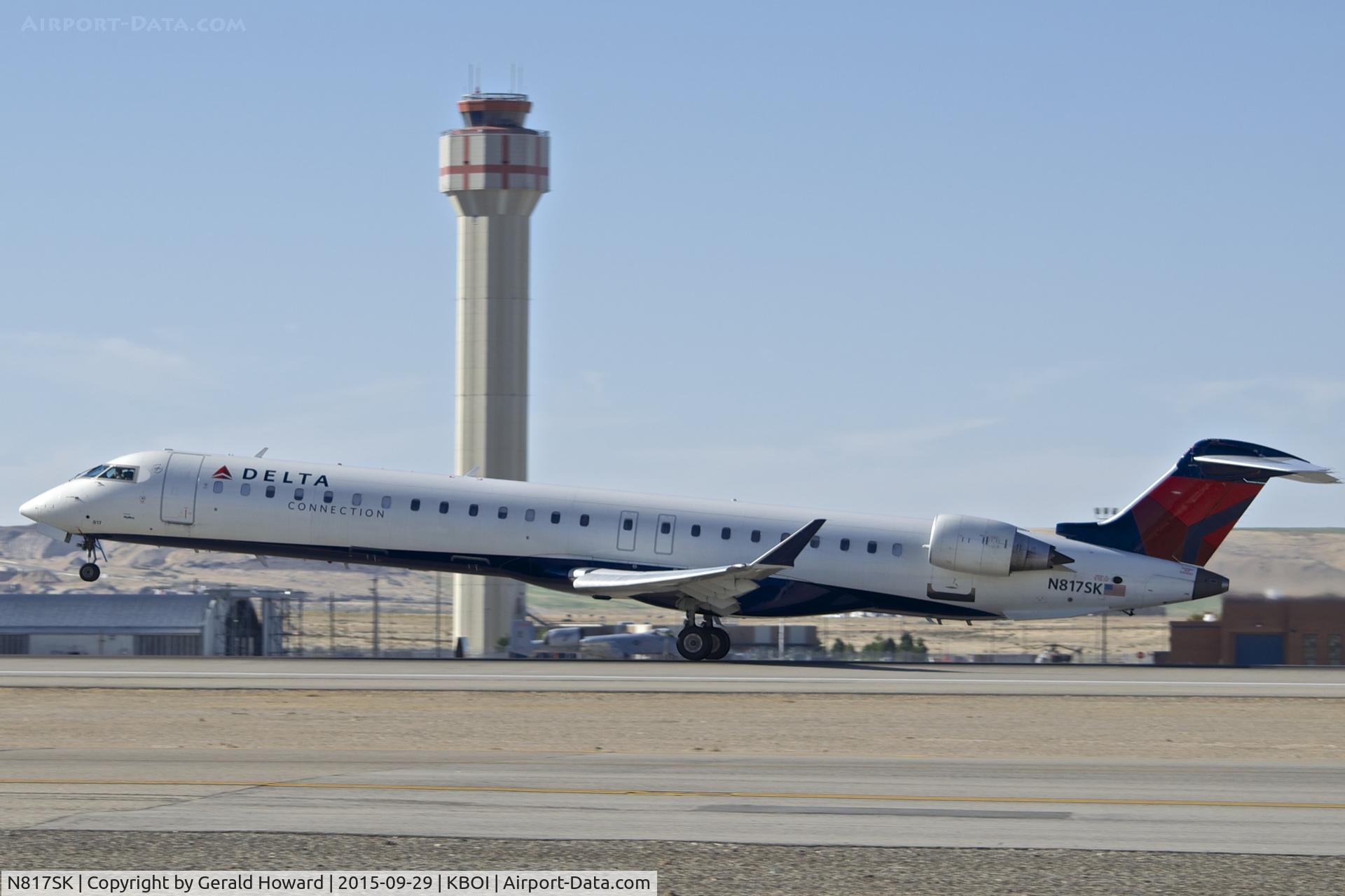 N817SK, 2006 Bombardier CRJ-900ER (CL-600-2D24) C/N 15107, Take off on RWY 10L.