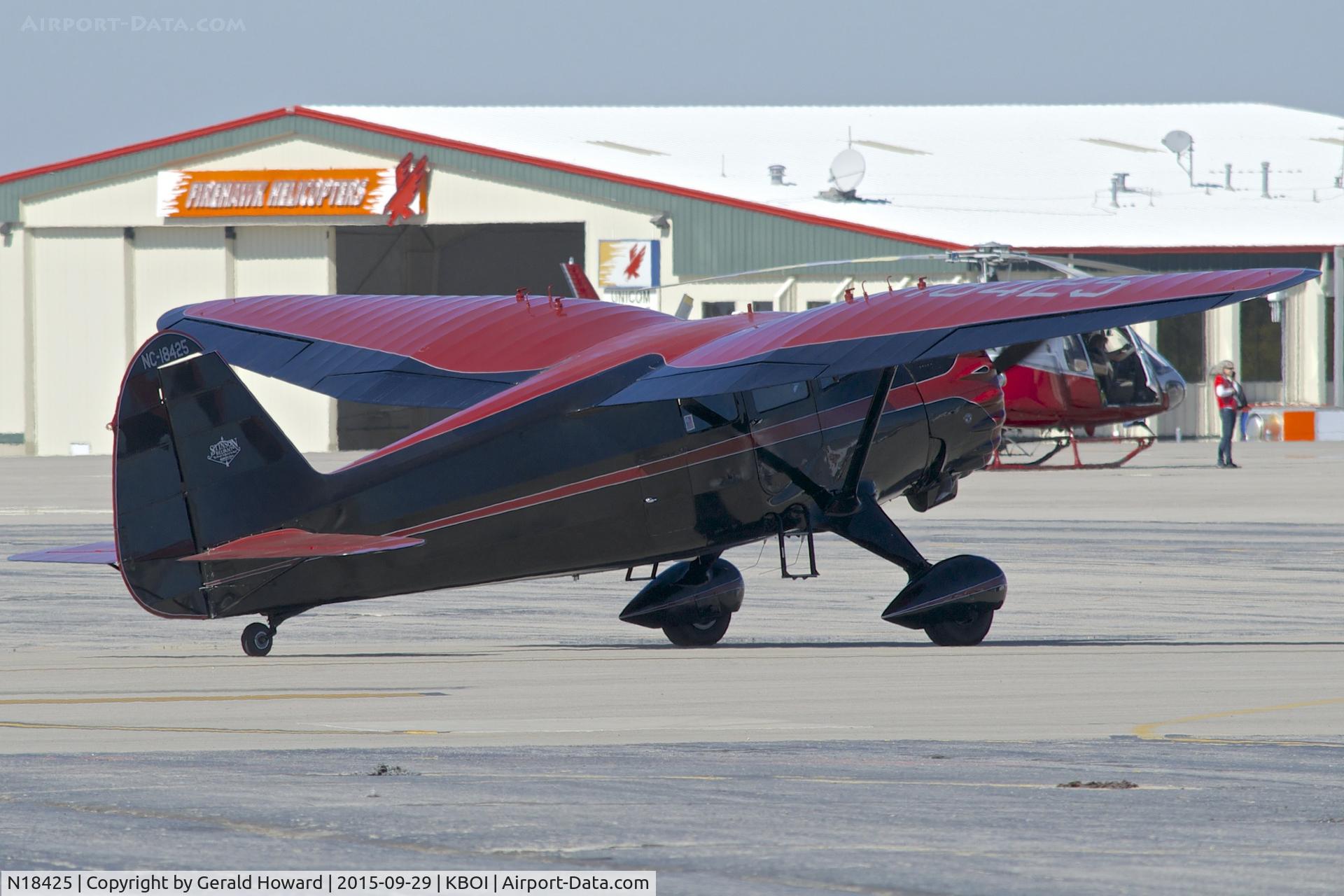 N18425, 1937 Stinson SR-9F Reliant C/N 5715, Parking on the north GA ramp.