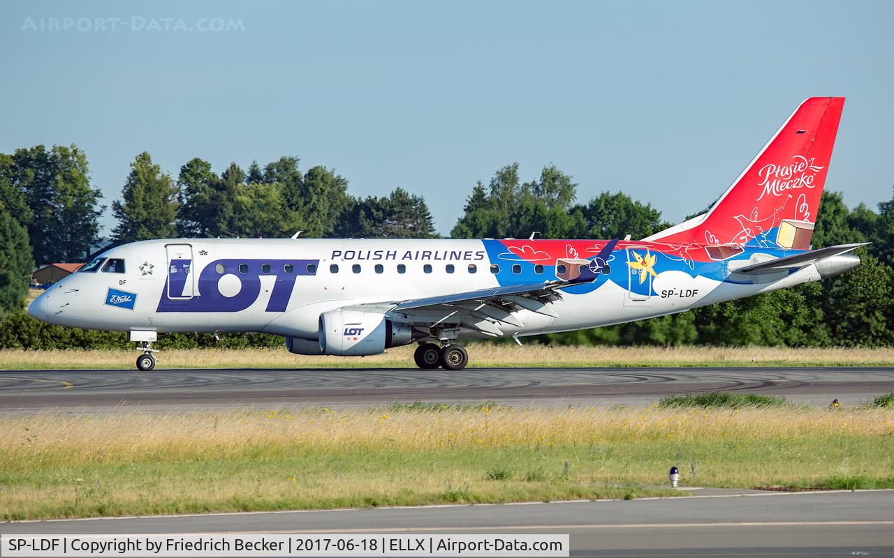 SP-LDF, 2004 Embraer 170ST (ERJ-170-100ST) C/N 17000035, decelerating after touchdown on RW06