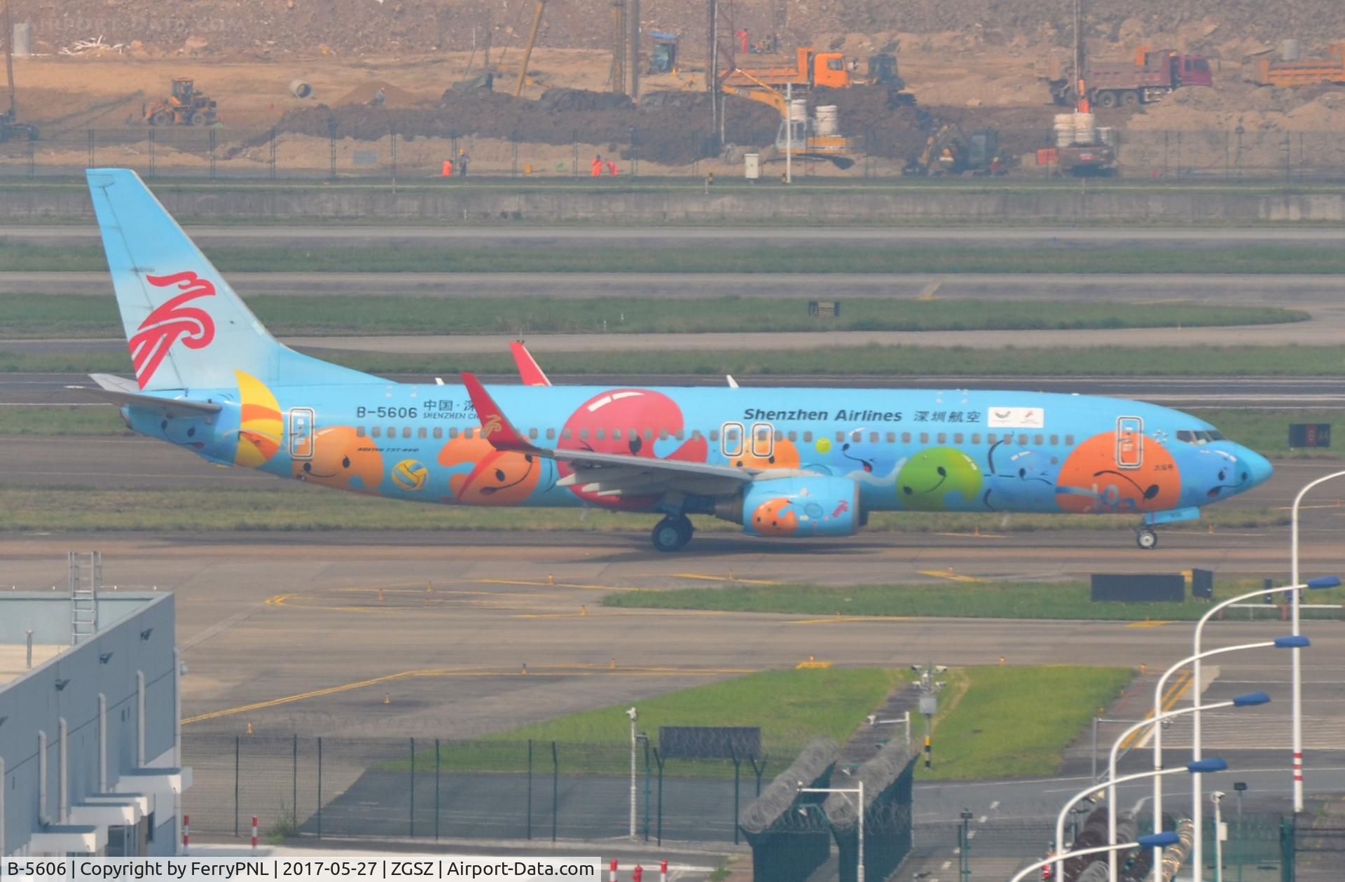 B-5606, 2011 Boeing 737-87L C/N 39143, Smiley's Shenzhen B738 taxying past.
