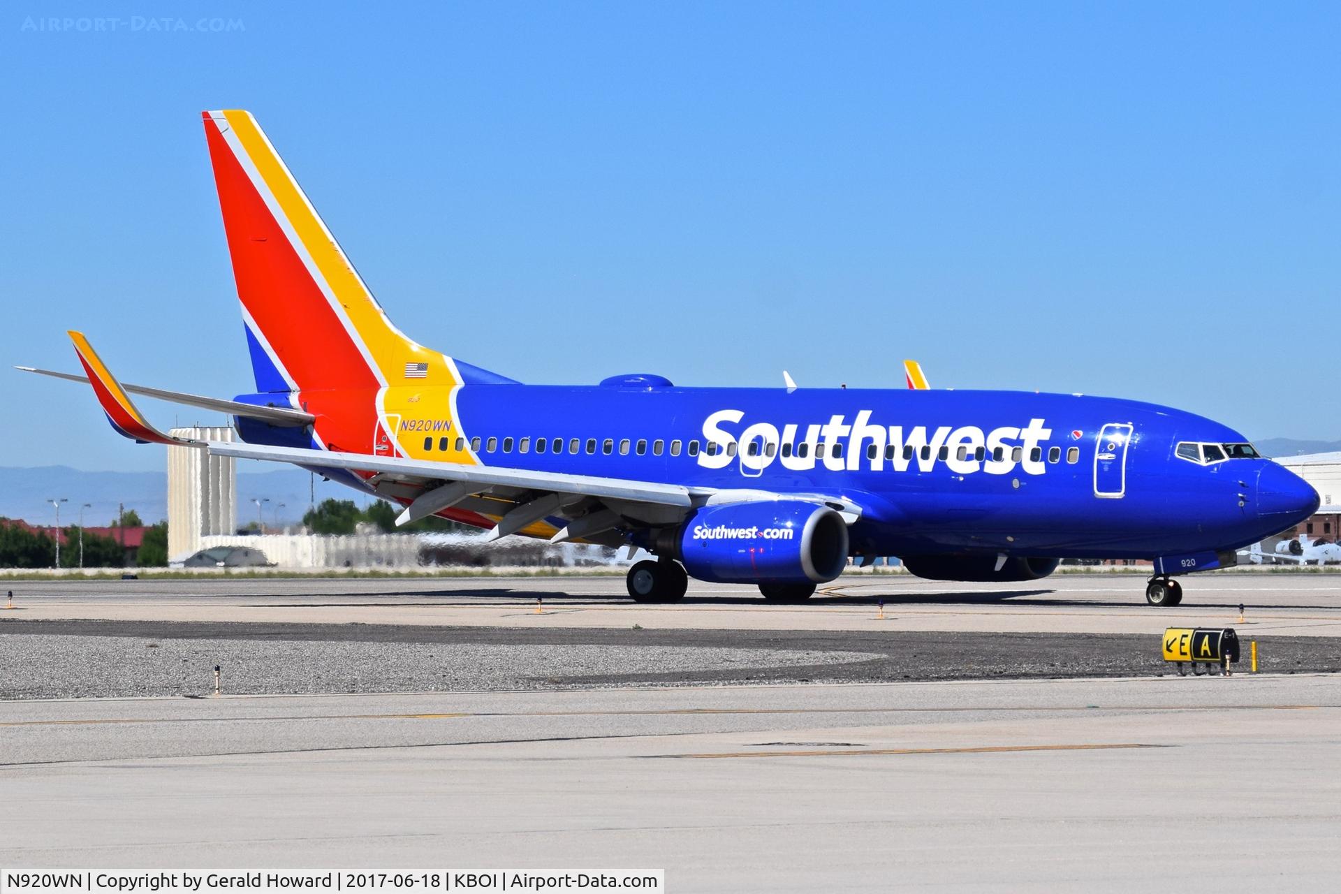N920WN, 2008 Boeing 737-7H4 C/N 32460, Turning off RWY 28R onto Taxiway Echo.