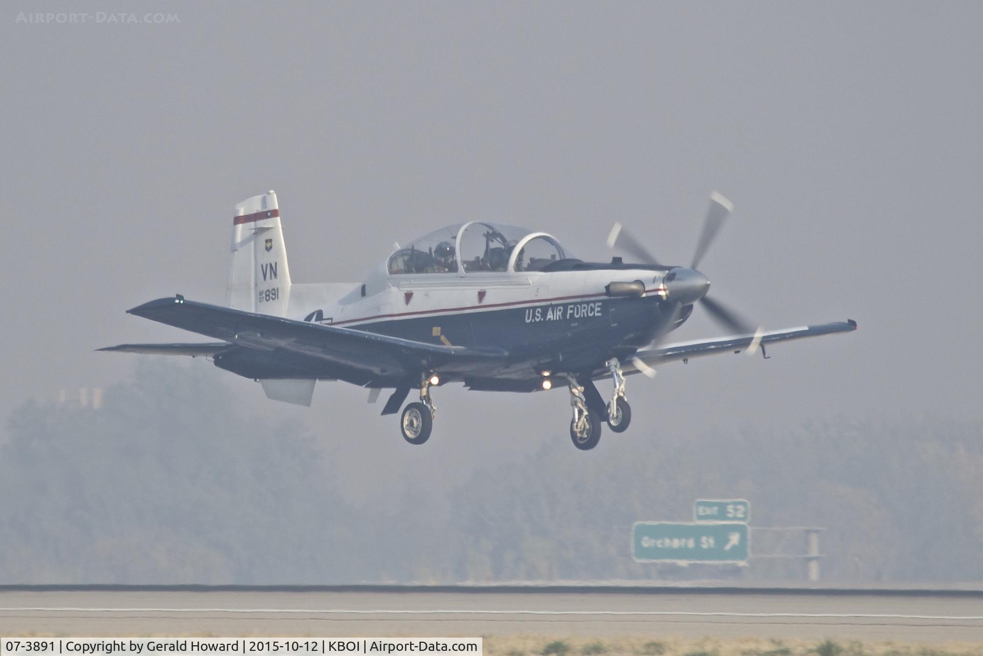 07-3891, 2007 Raytheon T-6A Texan II C/N PT-446, Taking off from RWY 10R in IFR smoke conditions. 71st Flying Training Wing, 8th Flying Training Squadron  “8 Ballers”, Vance AFB, OK.